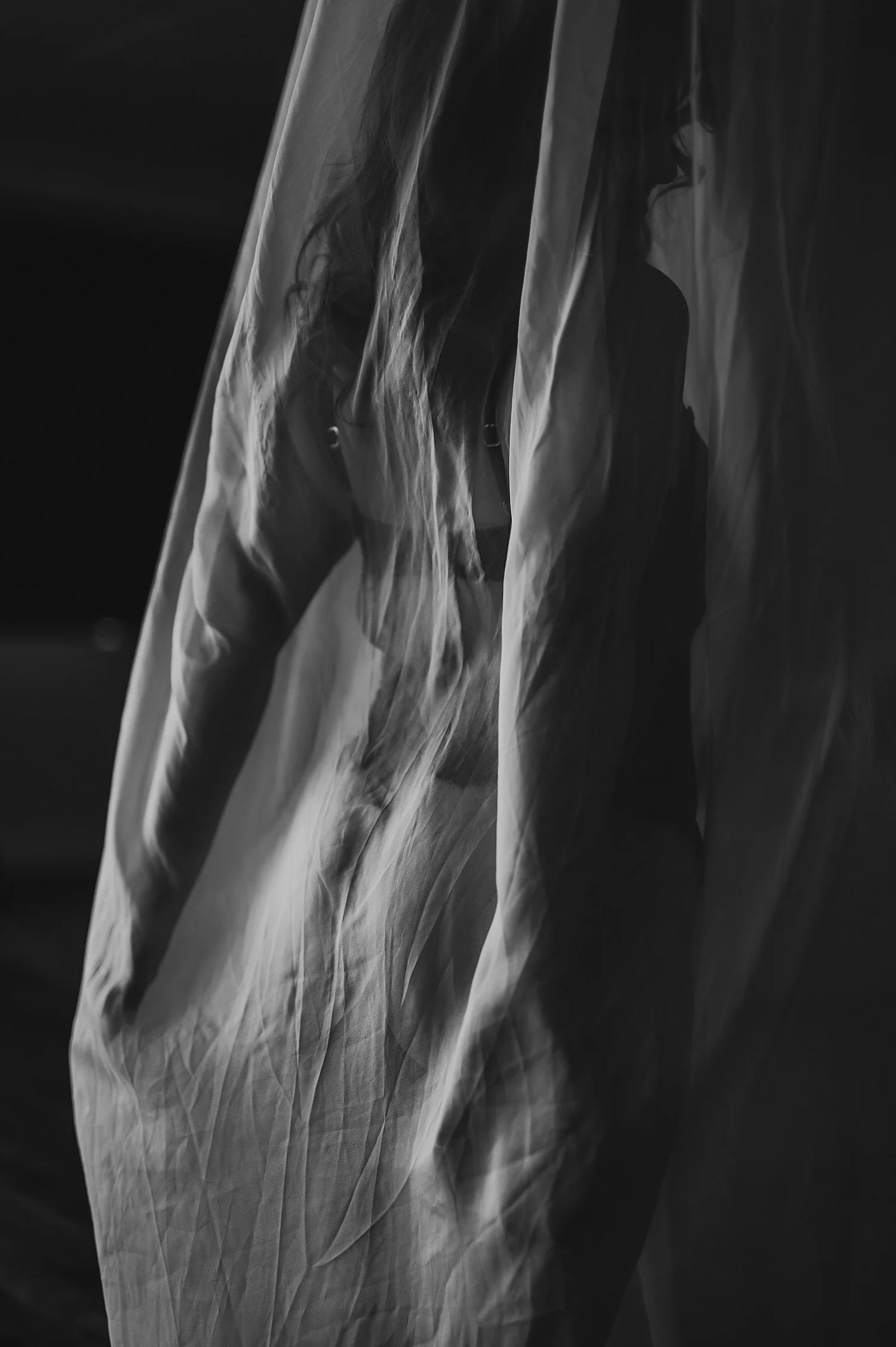 woman wrapped up in sheet discovering a confidence boost