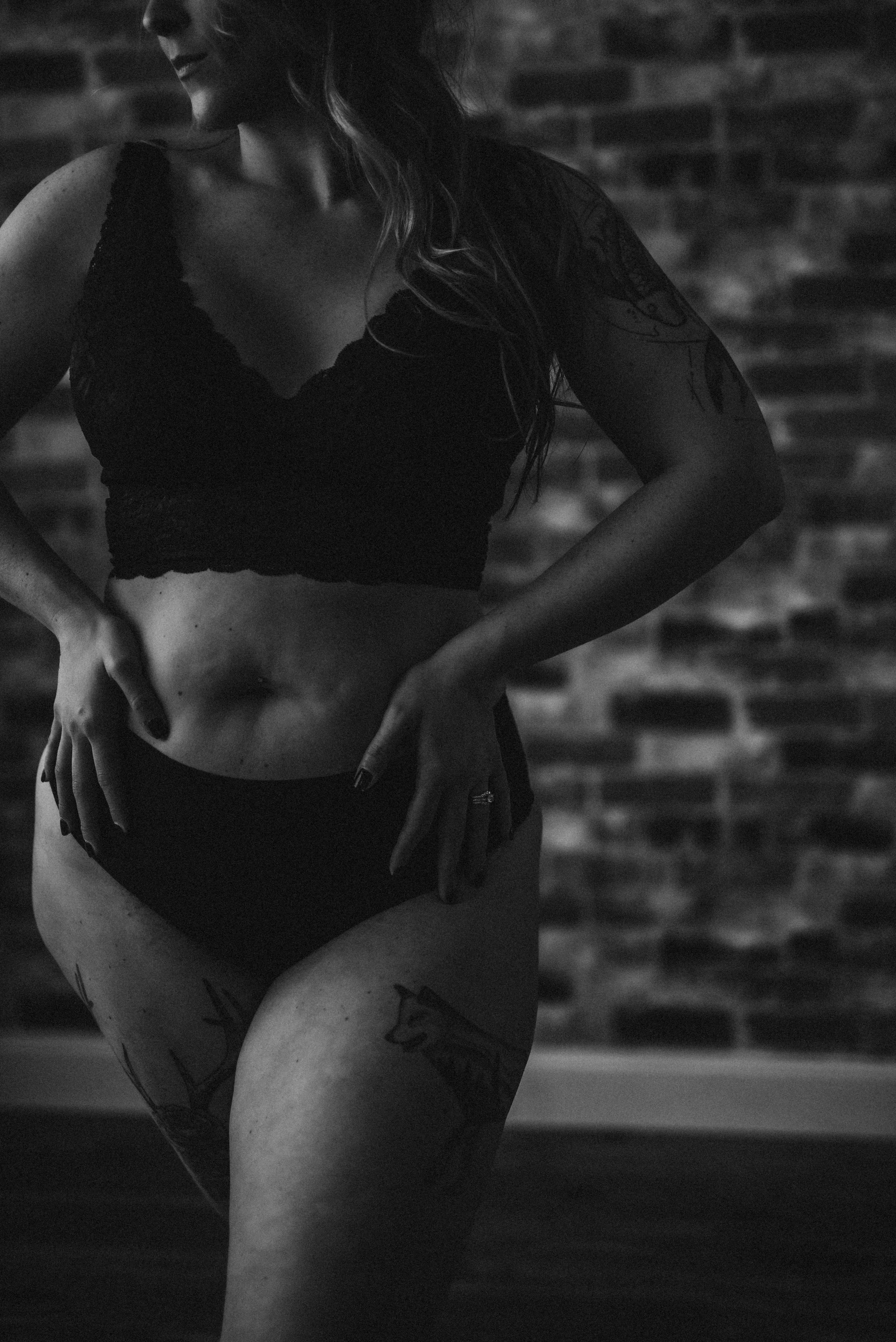 person in matching lace lingerie set by New Hampshire boudoir photographer