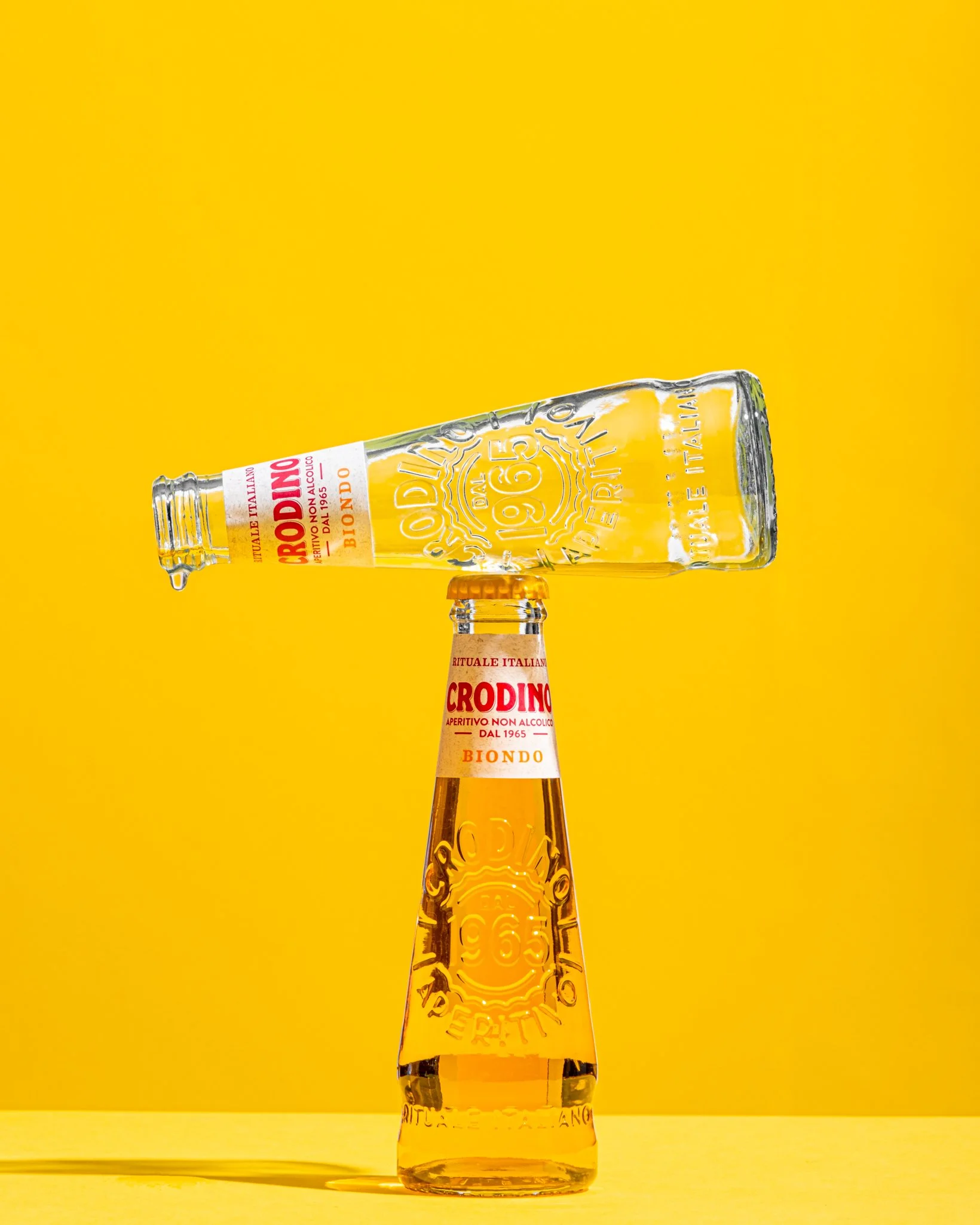 Crodino empty glass with drip