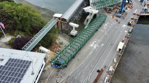 Truss spans on barge arriving at Bainbridge Island