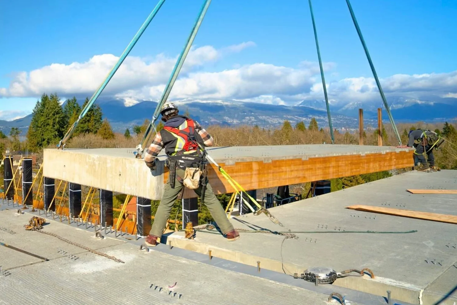 Ironworker installing CREE panel
