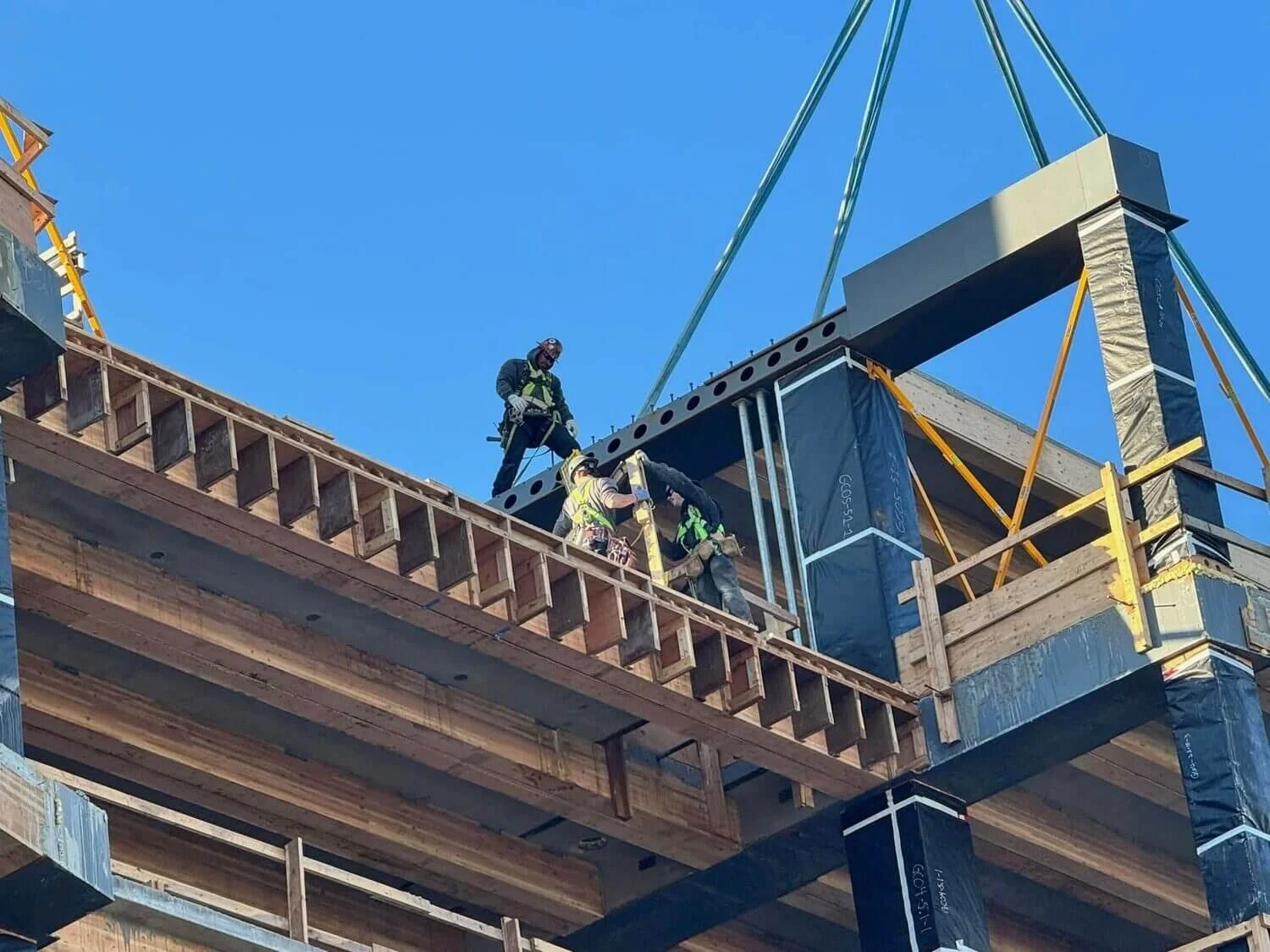 Ironworkers erecting DeltaBeam