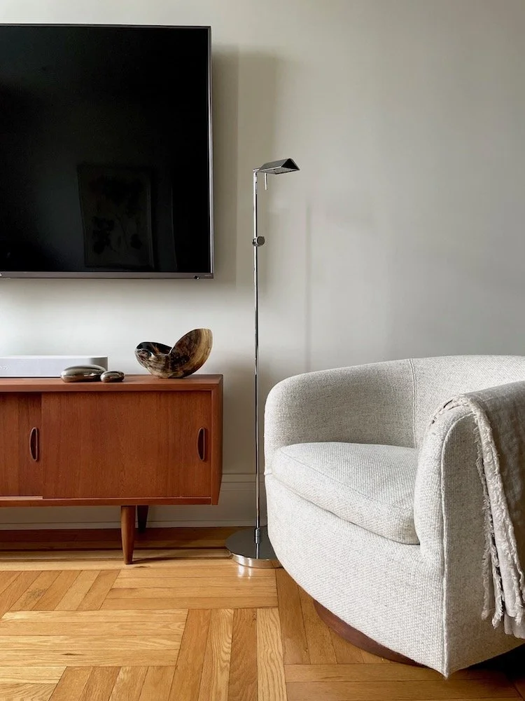 Living room design with vintage swivel chair