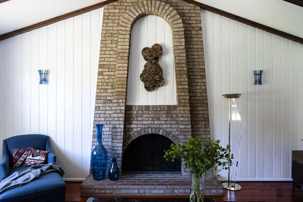 Family room with cathedral ceilings and fireplace niche