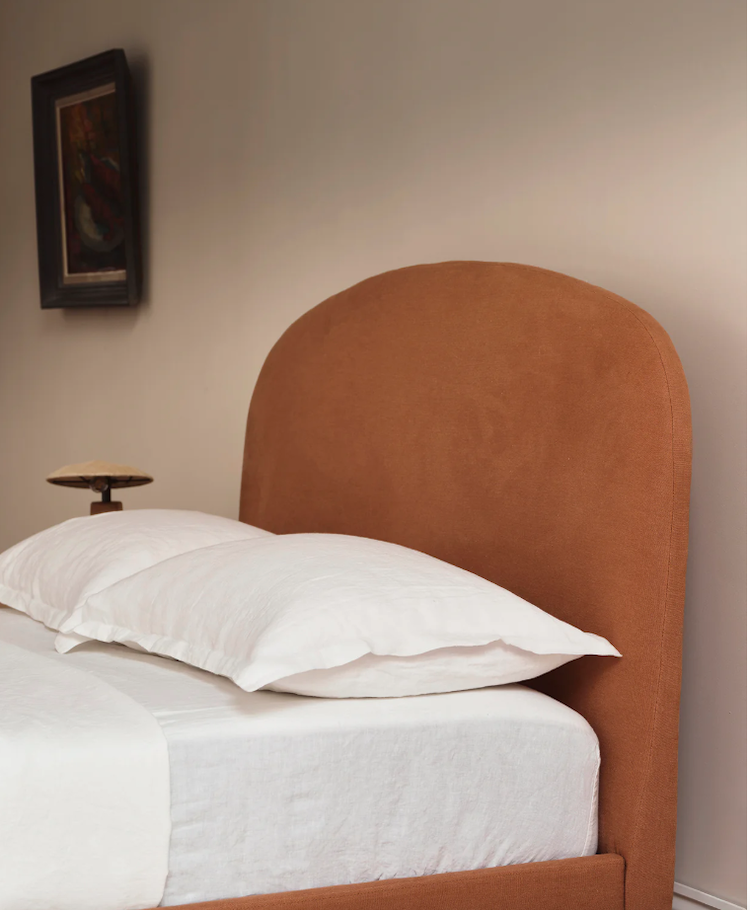 designer-curved-upholstered-bed.png