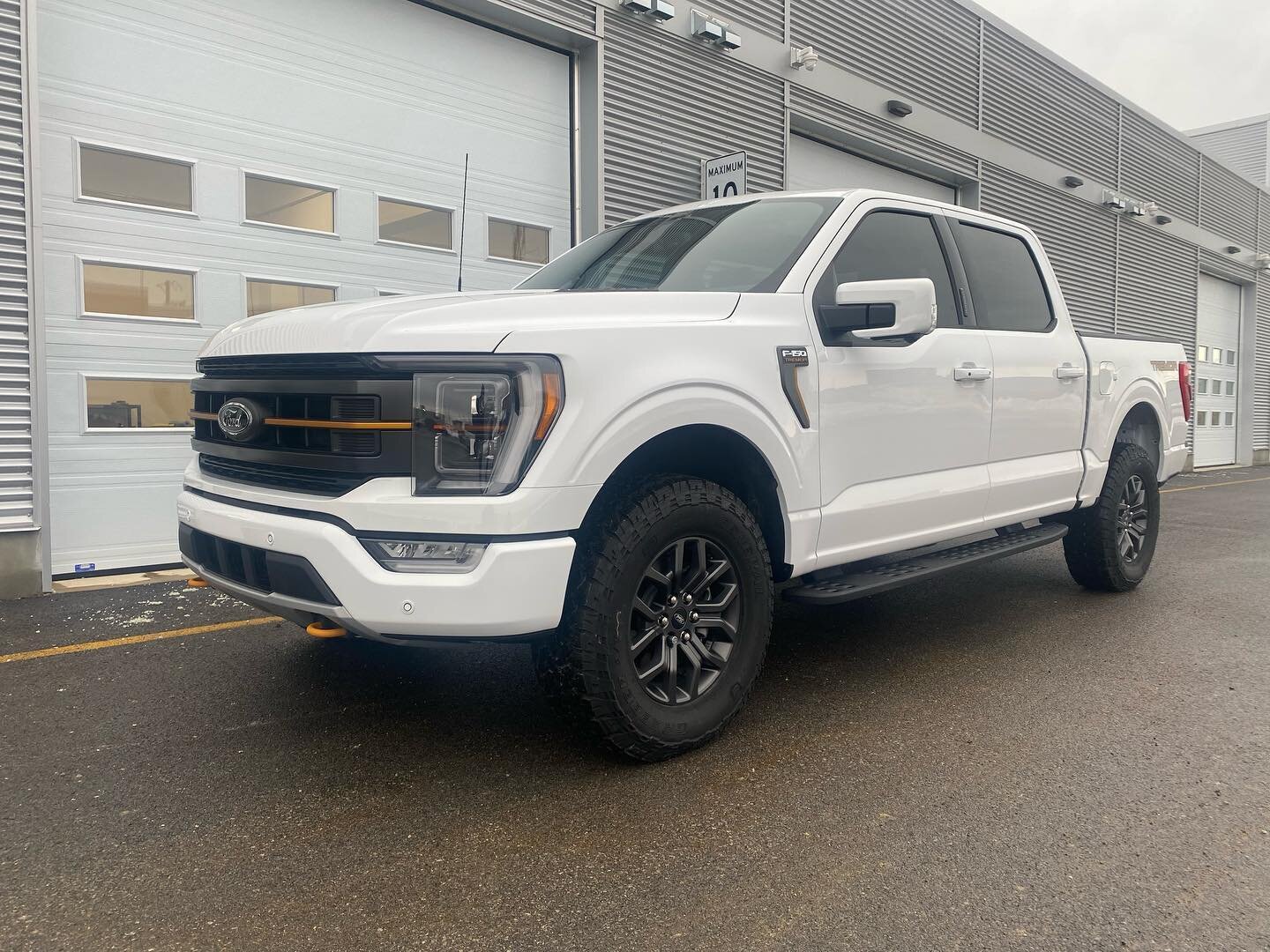 Keep your Ford F-150 Tremor looking fresh and protected with our partial front end paint protection film kit and 35% window film on the front. It's the perfect combo of style and protection. #FordF150 #Tremor #PaintProtection #WindowTinting #CarsofIn
