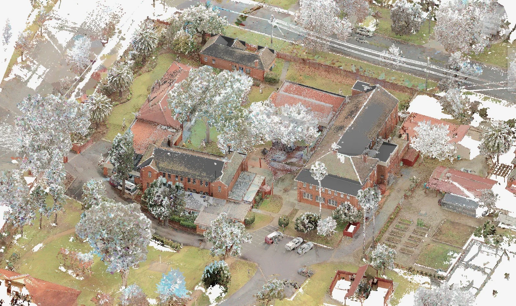 Geolocated LiDAR point cloud providing a highly accurate digital representation of a school campus and its surrounding environment.