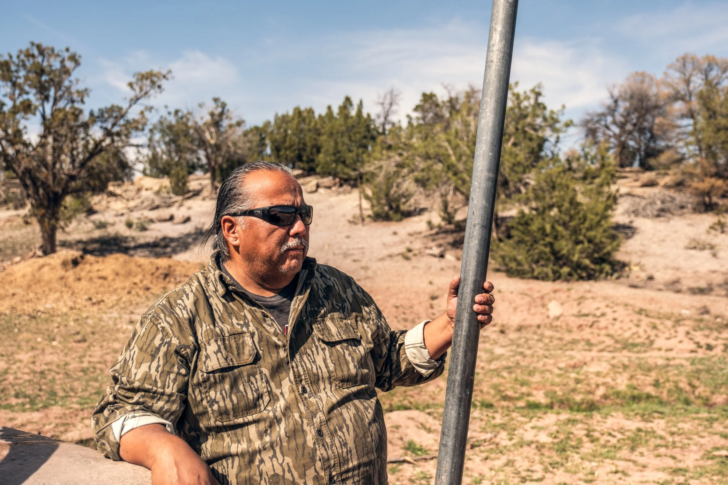 Hauling Life | Navajo Nation — Unified Metadata Paragraphs

Wayne Wilson and Joann Whiting collect water in Gallup, New Mexico at a community water source. The containers are filled, prepared, and loaded into their vehicle for transport across the Na