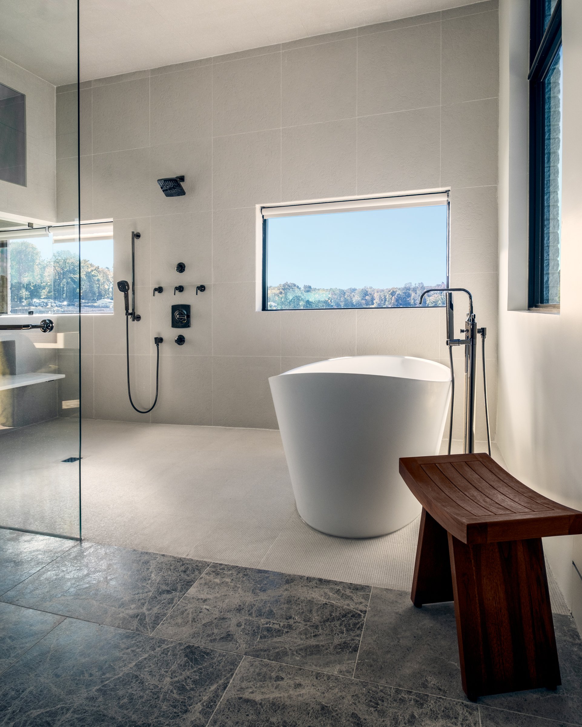 Architectural and interior photography of a customized lakefront home, highlighting design detail, atmosphere, infinity pool, and craftsmanship.