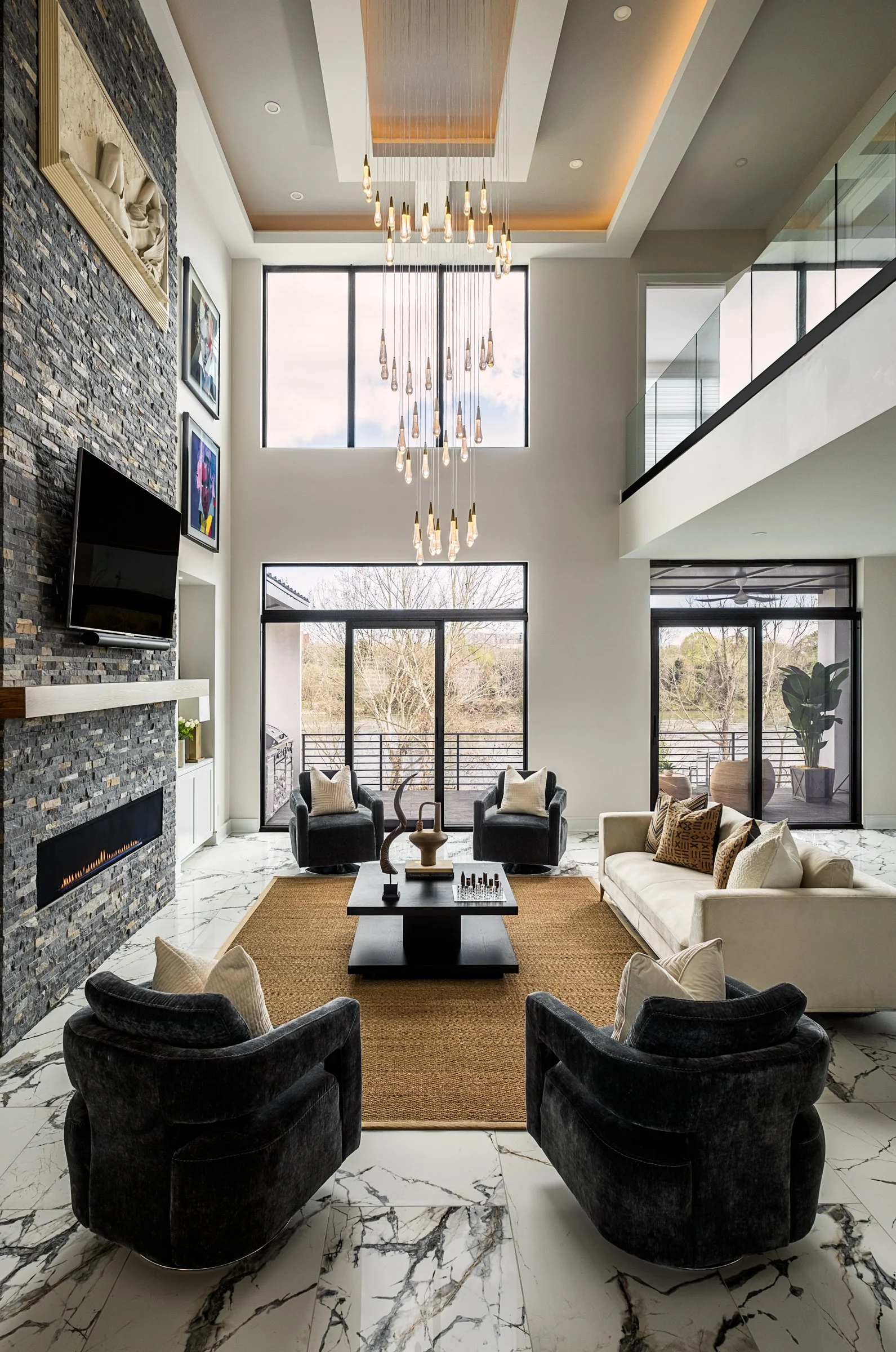 Architectural and interior photography of a customized lakefront home, highlighting design detail, atmosphere, infinity pool, and craftsmanship.