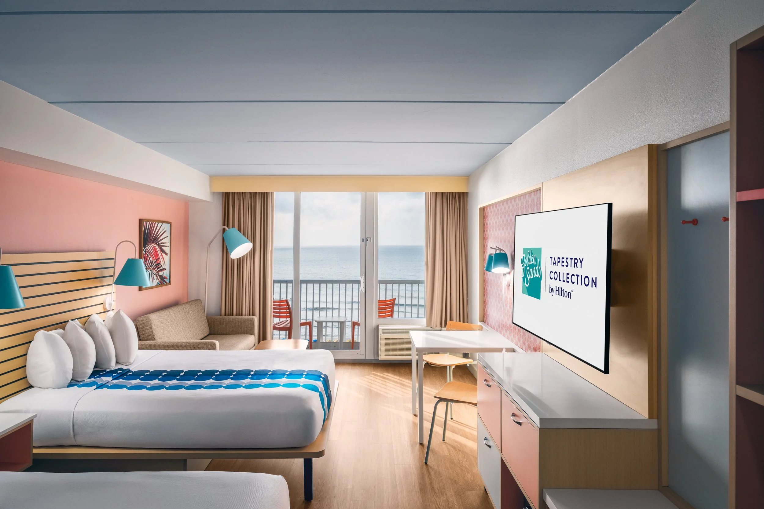 Warm hospitality photography of guest room at Golden Sands Hotel, showing thoughtful composition, branded consistency, and uncluttered guest environment.