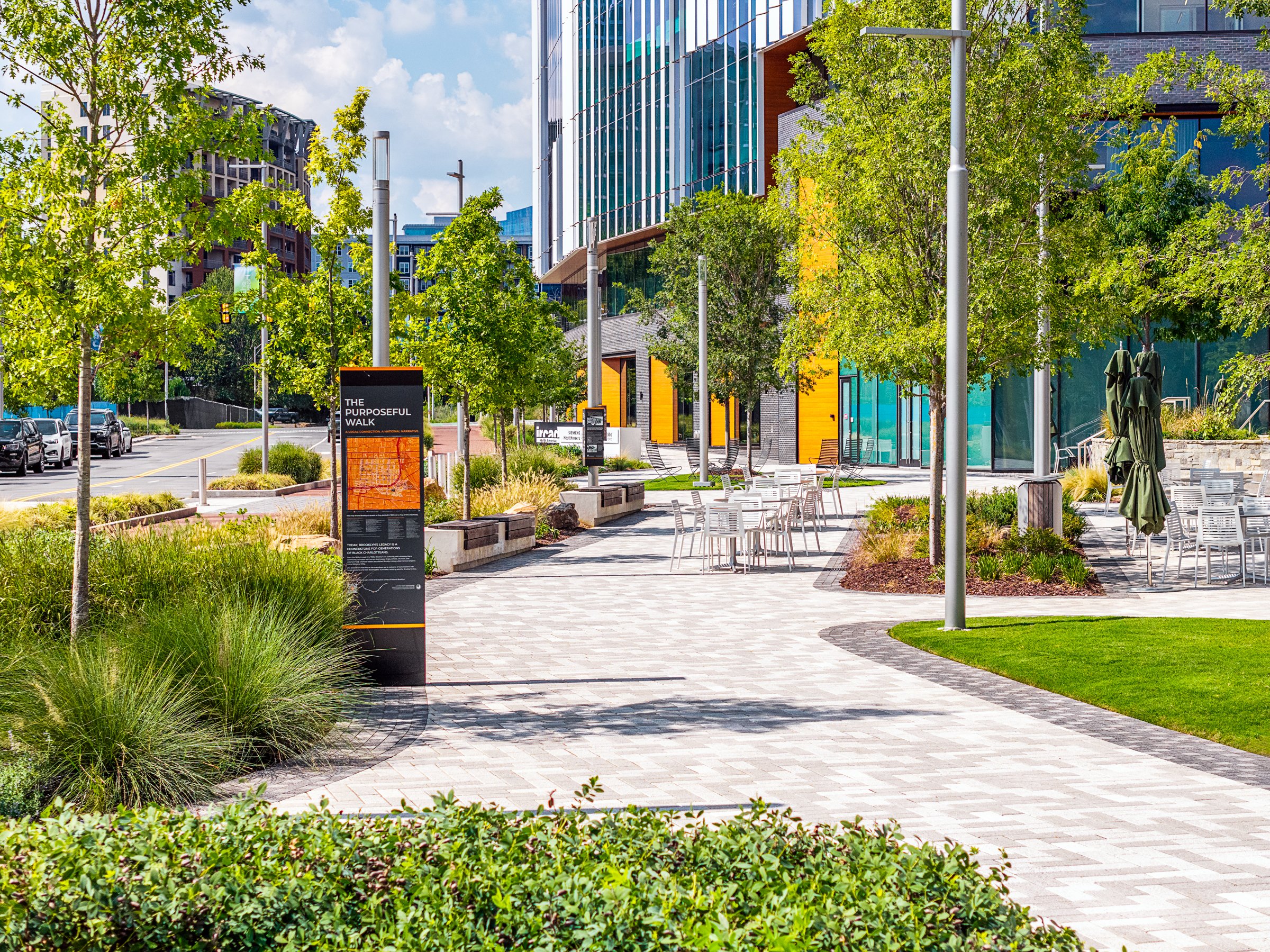 Landscape architecture photography of The Pearl in Charlotte, North Carolina, commissioned by Kimley-Horn and photographed by Paul Lange of Lange Photo Studio. The project features landscaped public spaces, a terraced central plaza, and the Purposefu