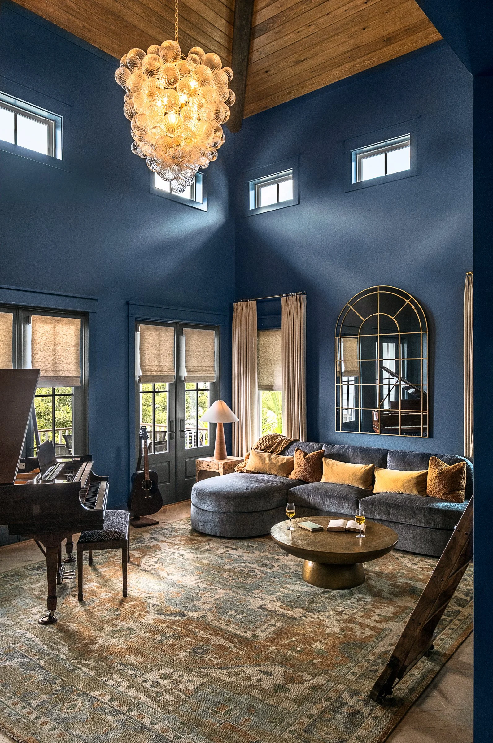 Dwelling Place Interiors luxury residential interior design project featuring a custom kitchen renovation, high-end cabinetry and millwork, detailed tilework, beautifully designed bathrooms, living spaces, bookshelves, and outdoor living areas, photo