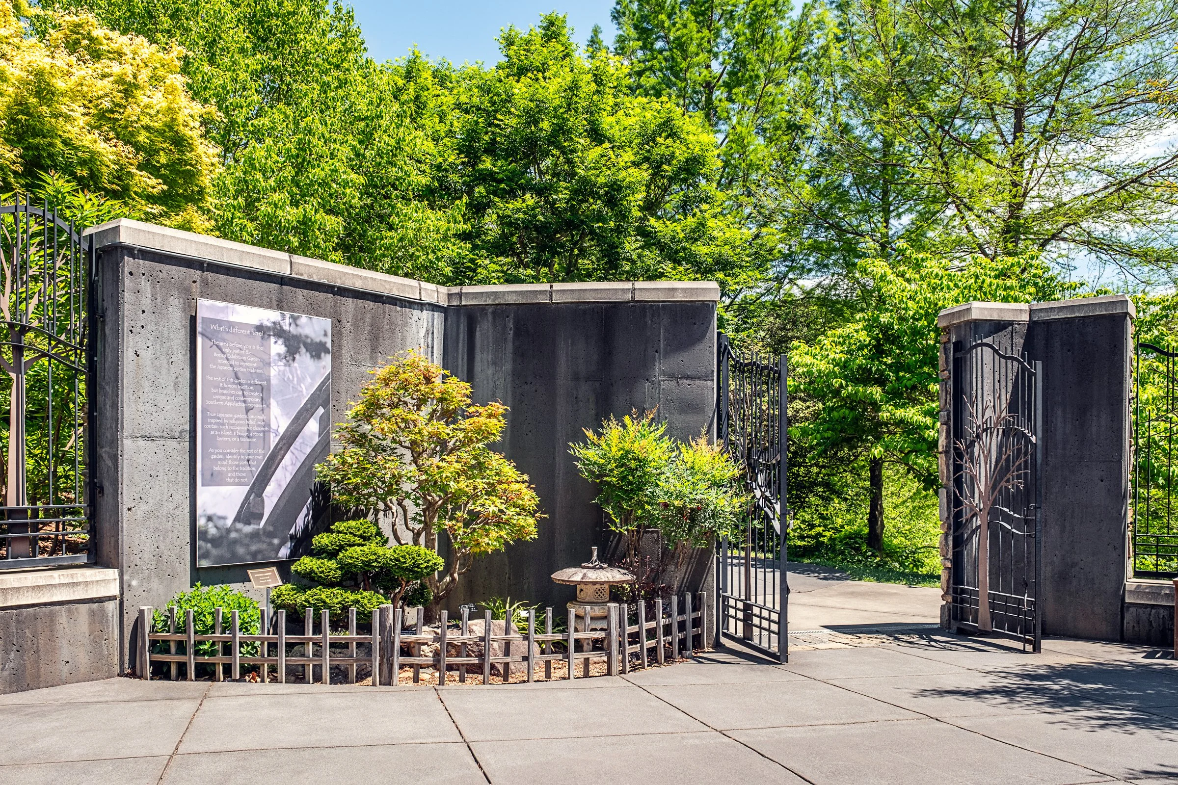 A quiet garden path and bonsai display at the North Carolina Arboretum near Asheville, North Carolina. Photographed by Lange Photo Studio. 