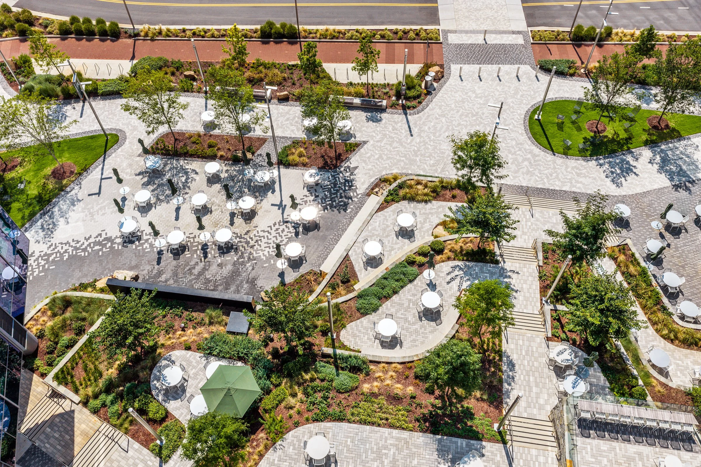 Landscape architecture photography of The Pearl in Charlotte, North Carolina, commissioned by Kimley-Horn and photographed by Paul Lange of Lange Photo Studio. The project features landscaped public spaces, a terraced central plaza, and the Purposefu
