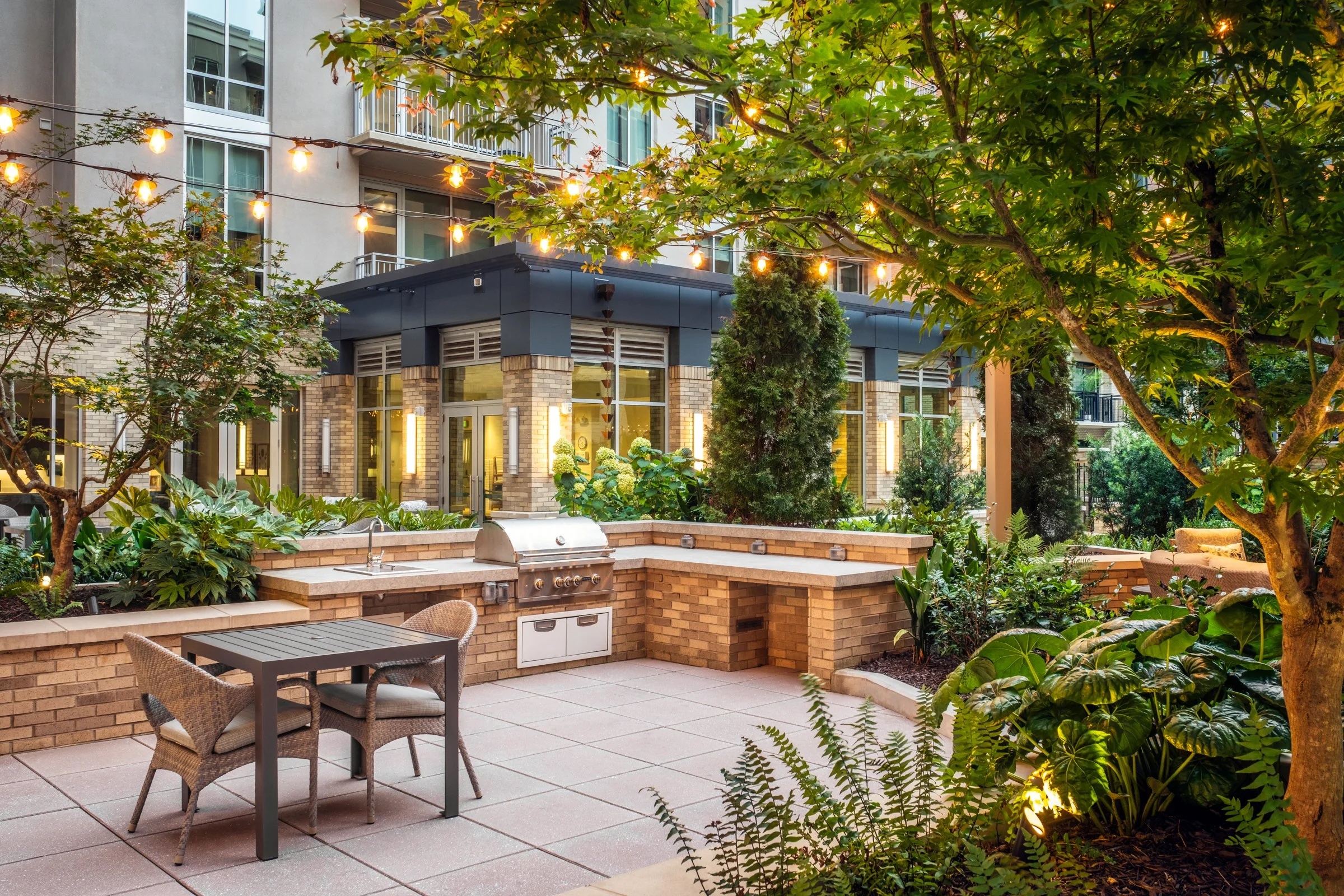 Village on Morehead a 55+ luxury senior living community showcasing the amenity courtyard, landscape design, by LandDesign in Charlotte, NC. Created by Lange Photo Studio.