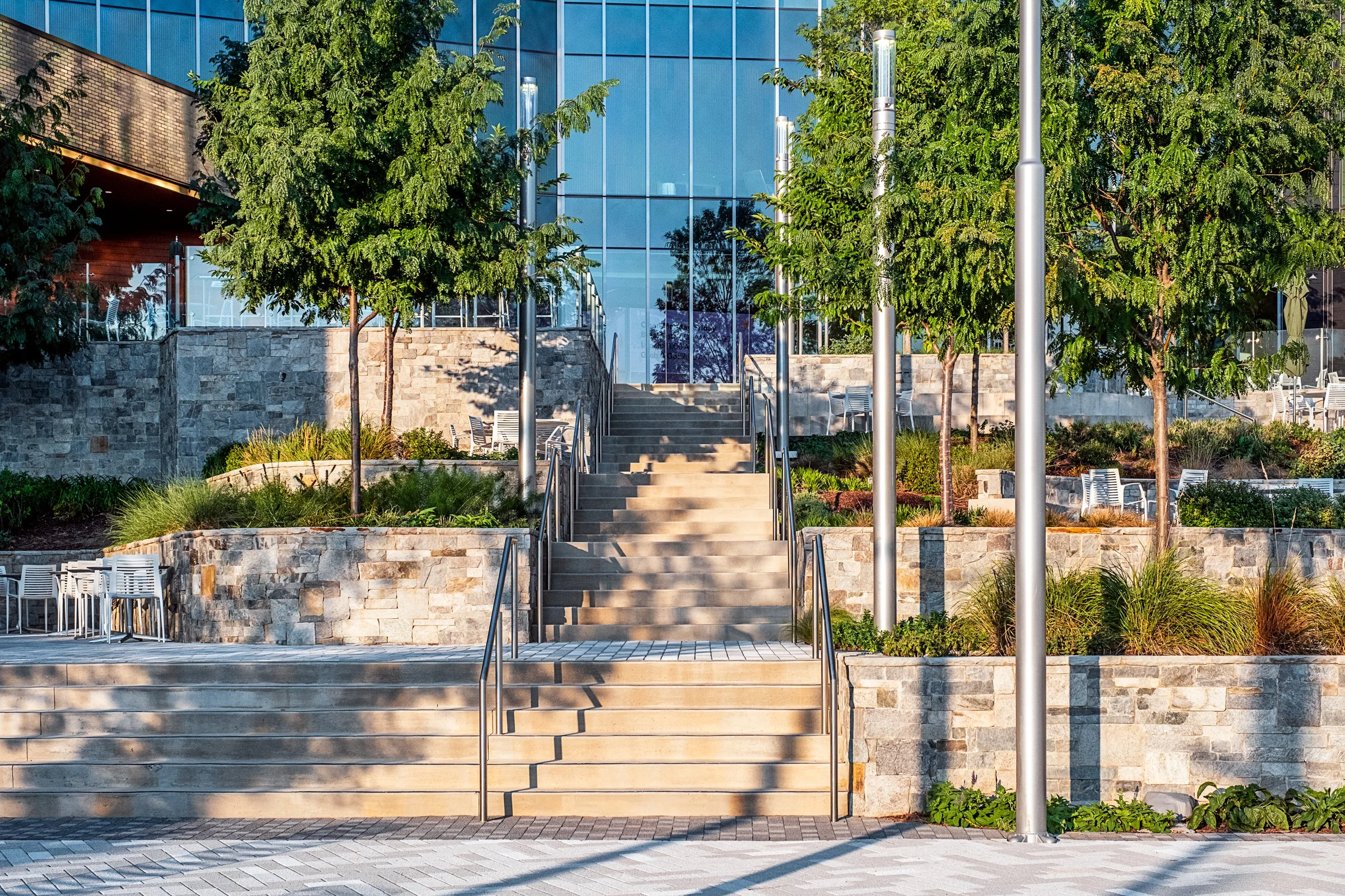 Landscape architecture photography of The Pearl in Charlotte, North Carolina, commissioned by Kimley-Horn and photographed by Paul Lange of Lange Photo Studio. The project features landscaped public spaces, a terraced central plaza, and the Purposefu