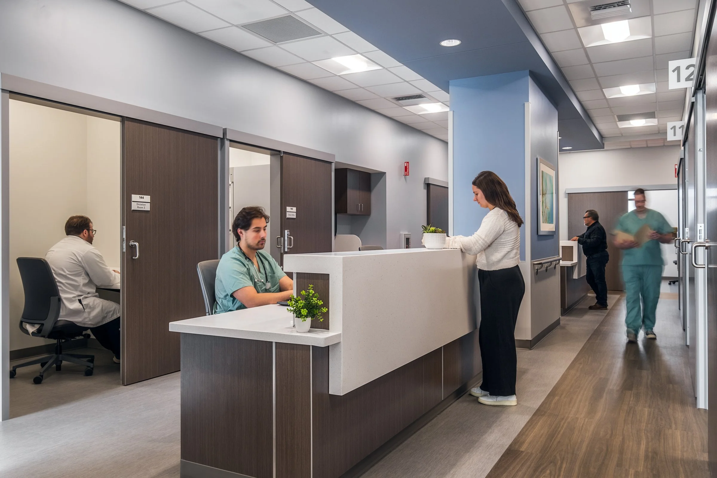Atrium Health Clinic, designed by CPL Architecture, check in space for nurses and doctors, and patients, photographed by Lange Photo Studio. 