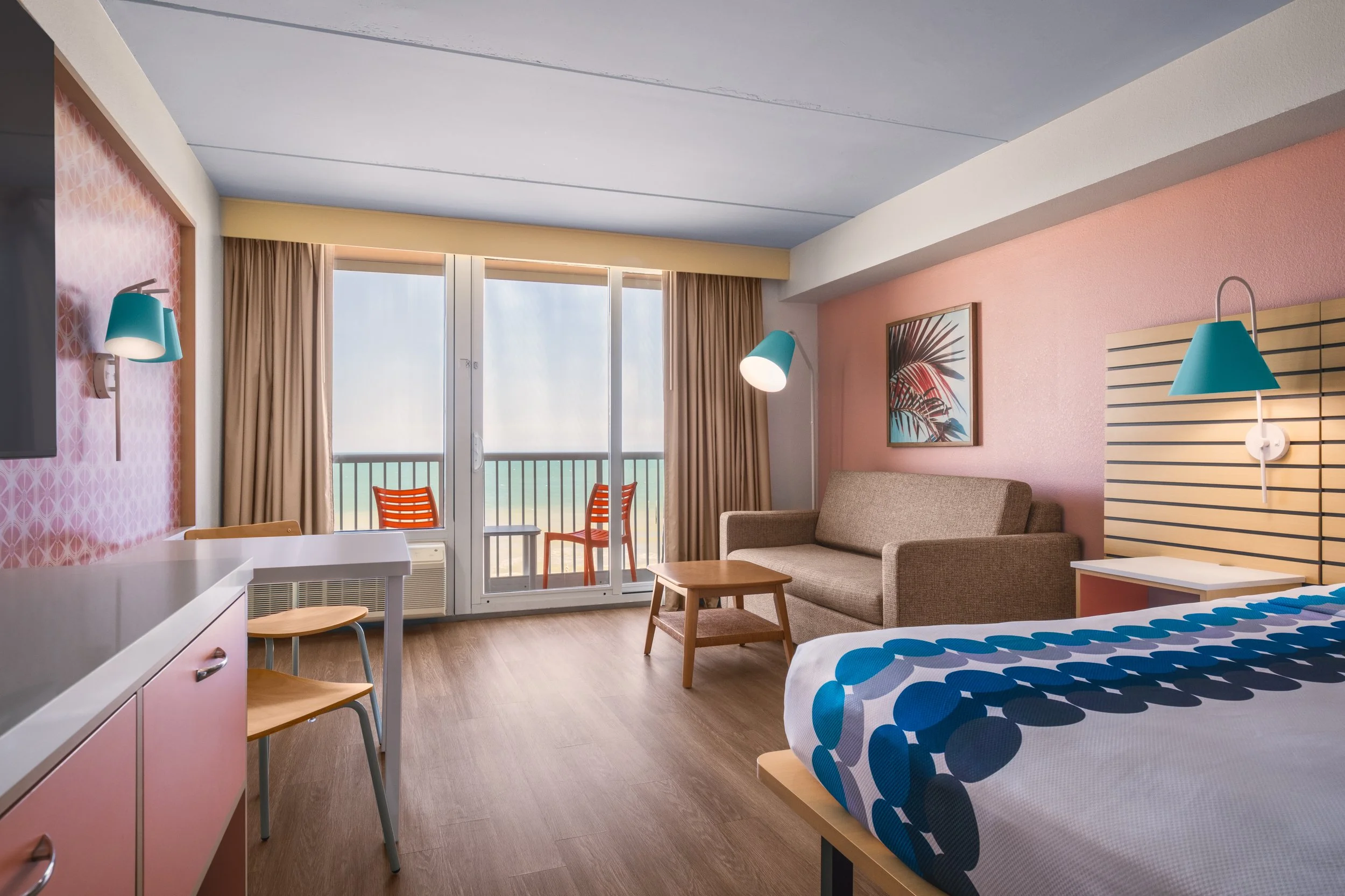 Photograph of guest room at Golden Sands Hotel, featuring crisp lighting, minimalist setup, and adherence to Hilton guest-ready standards.