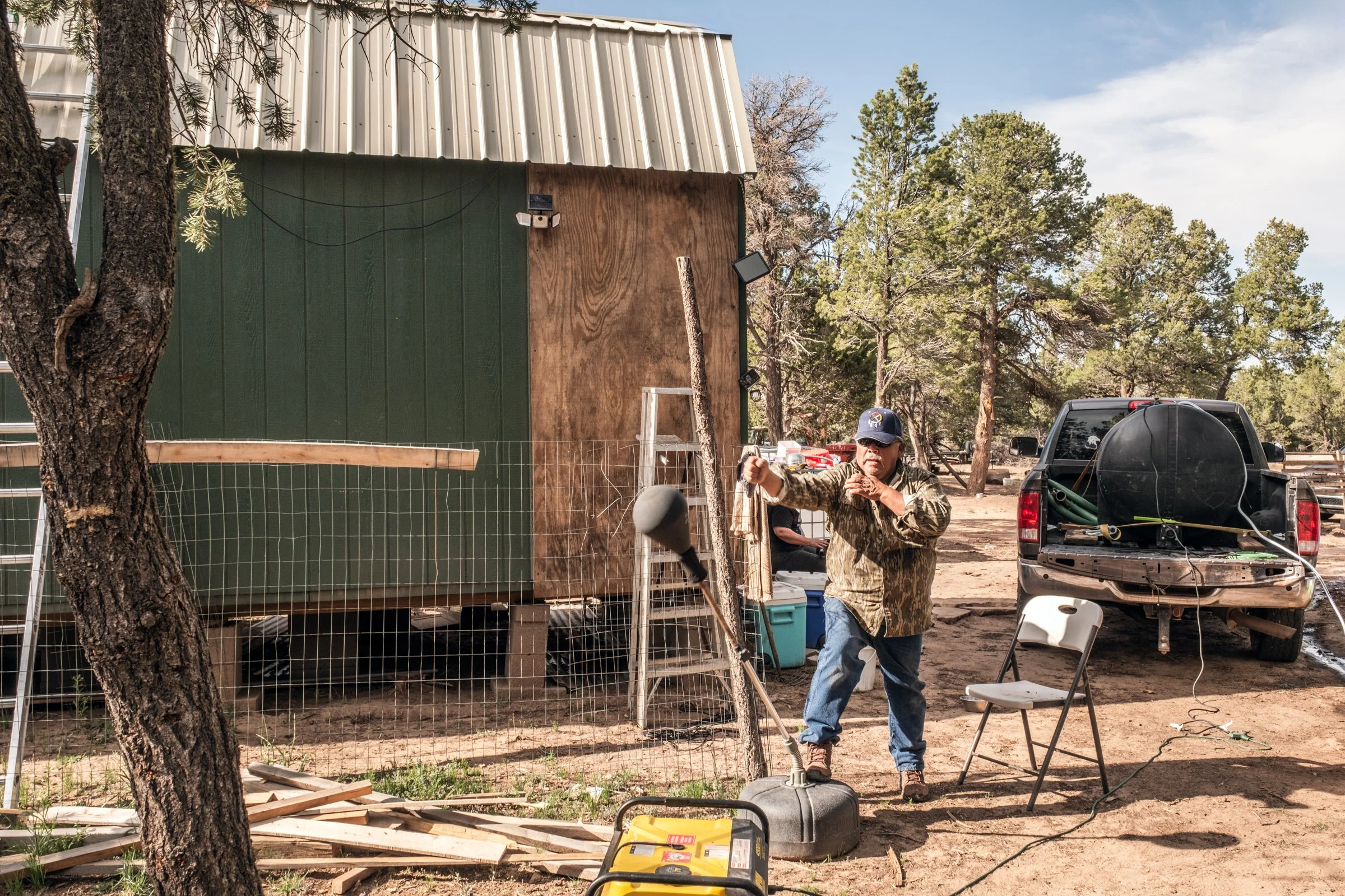 Wayne Wilson and Joann Whiting collect water in Gallup, New Mexico at a community water source. The containers are filled, prepared, and loaded into their vehicle for transport across the Navajo Nation.

They depart on a long route through the desert