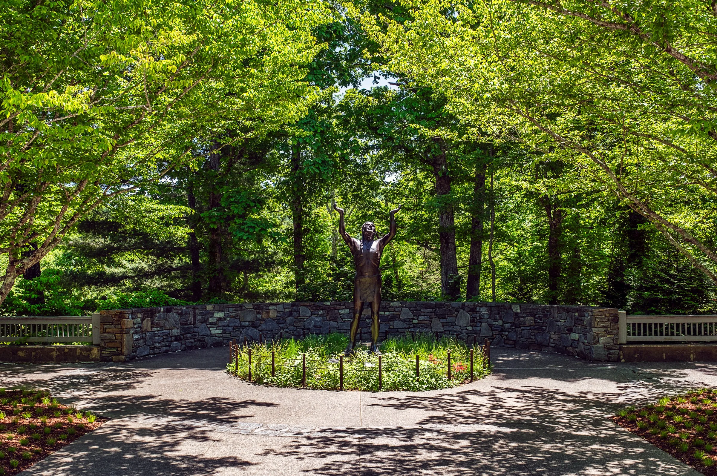 A quiet garden path and bonsai display at the North Carolina Arboretum near Asheville, North Carolina. Photographed by Lange Photo Studio. 