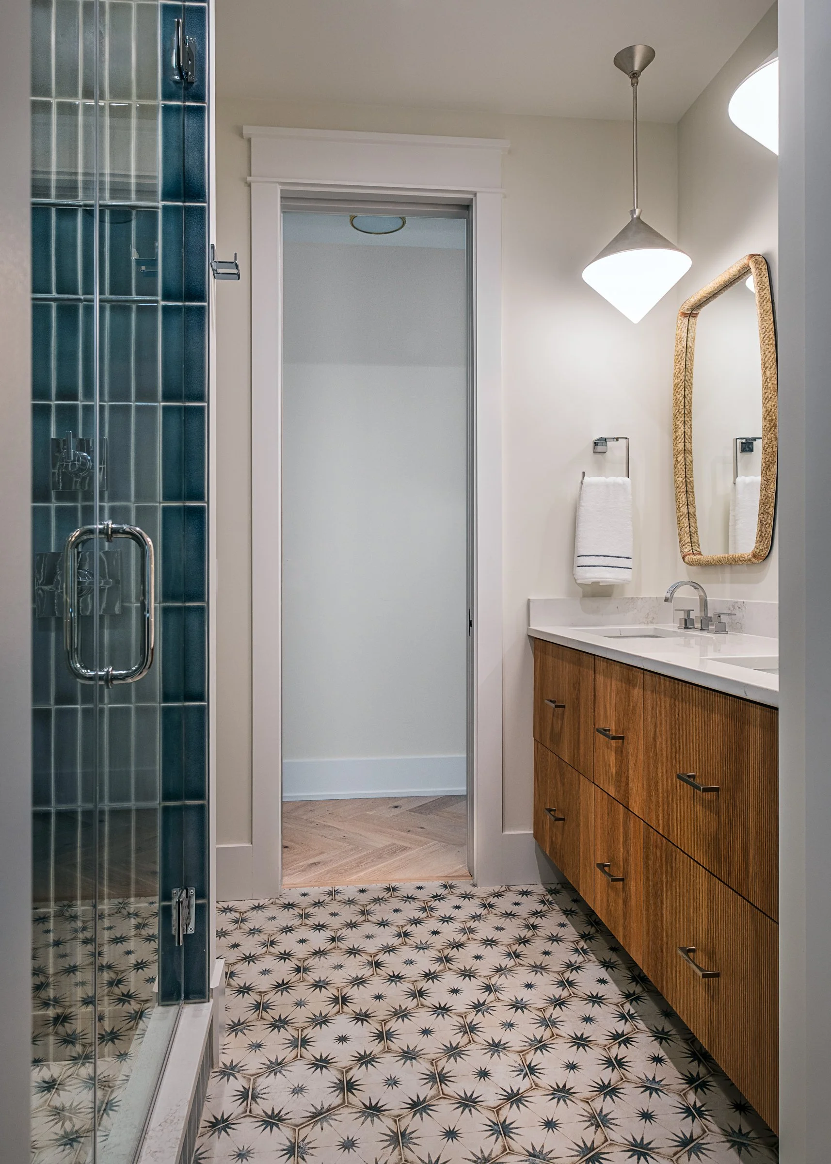 Dwelling Place Interiors luxury residential interior design project featuring a custom kitchen renovation, high-end cabinetry and millwork, detailed tilework, beautifully designed bathrooms, living spaces, bookshelves, and outdoor living areas, photo