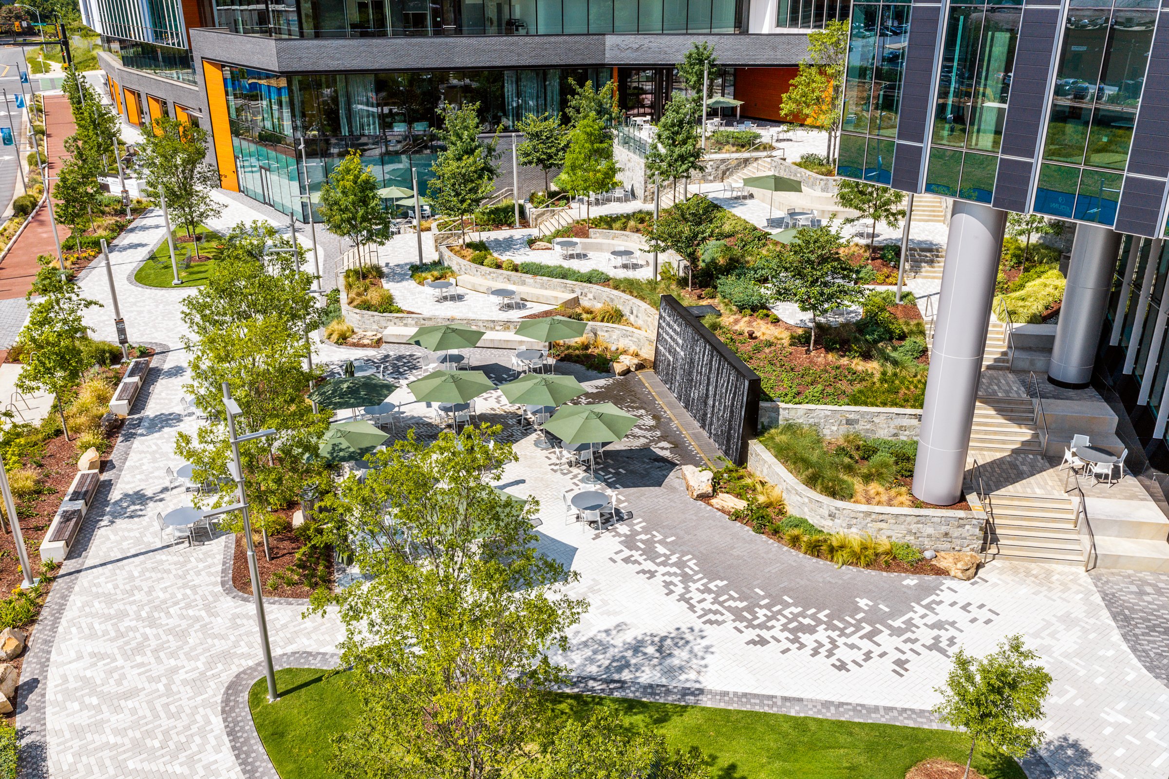 Landscape architecture photography of The Pearl in Charlotte, North Carolina, commissioned by Kimley-Horn and photographed by Paul Lange of Lange Photo Studio. The project features landscaped public spaces, a terraced central plaza, and the Purposefu