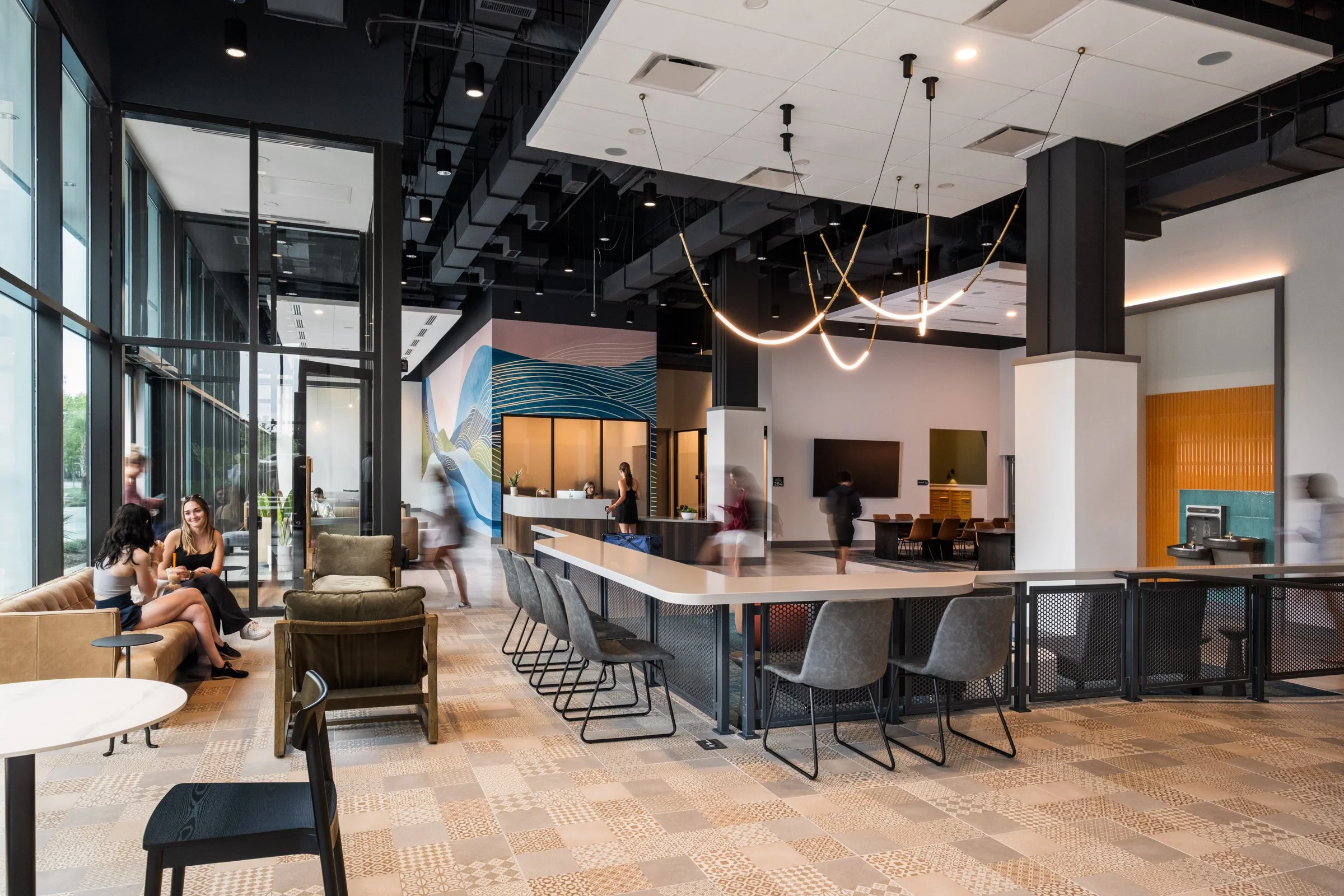 Architectural and lifestyle photography by Paul Lange of Lange Photo Studio, showcasing Gateway 737, a 940-bed student housing community near the University of South Carolina. The series captures the building's modern design, vibrant communal spaces,