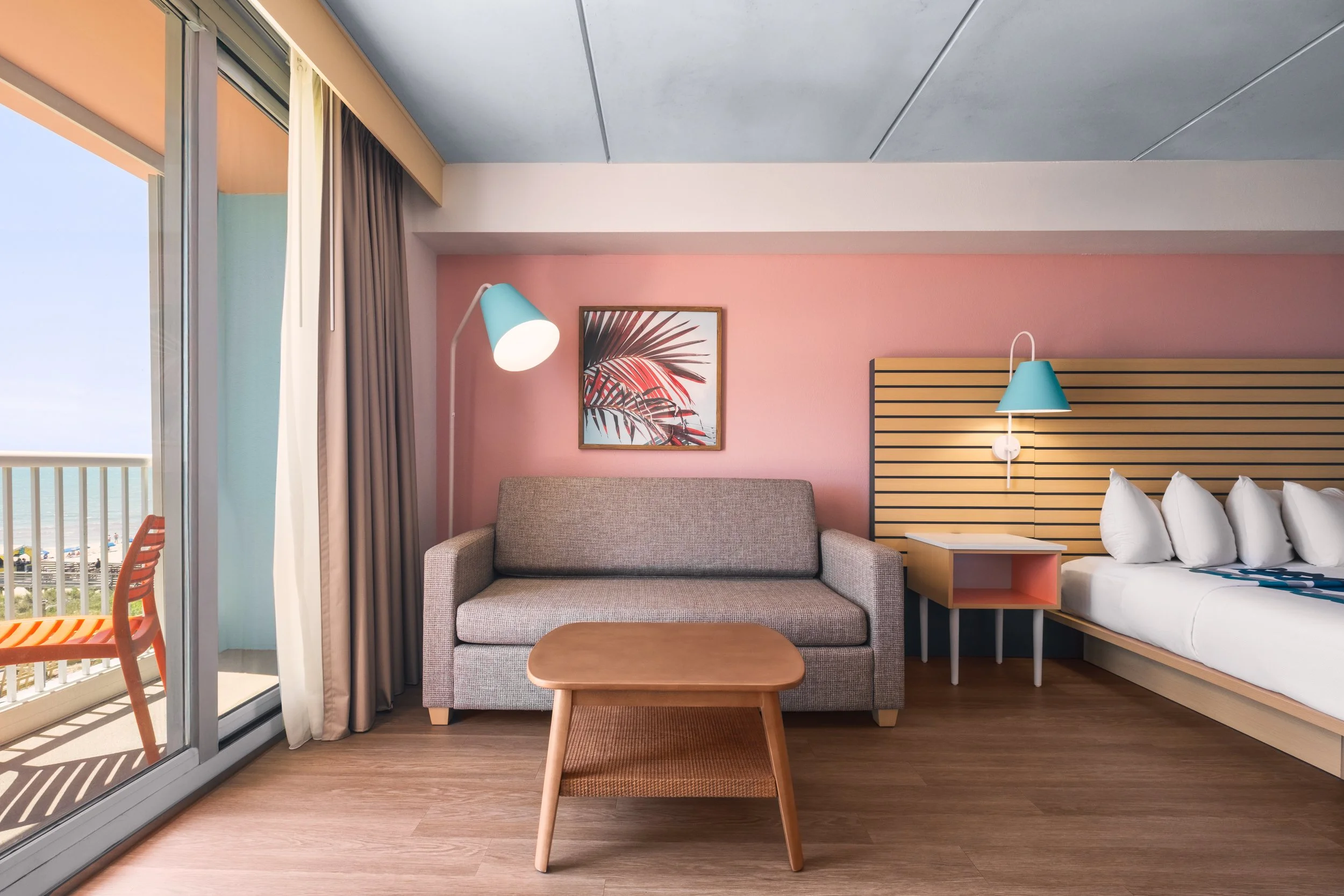 Warm hospitality photography of guest room at Golden Sands Hotel, showing thoughtful composition, branded consistency, and uncluttered guest environment.