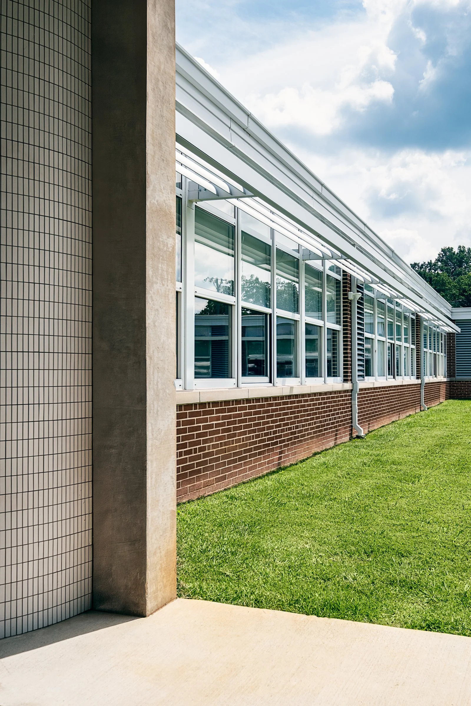 Interior view at Tri-cities Christian academy, highlighting [space/design feature] and the renovated student living environment. Completed by Johnson Architectue and photographed by Lange Photo Studio. 