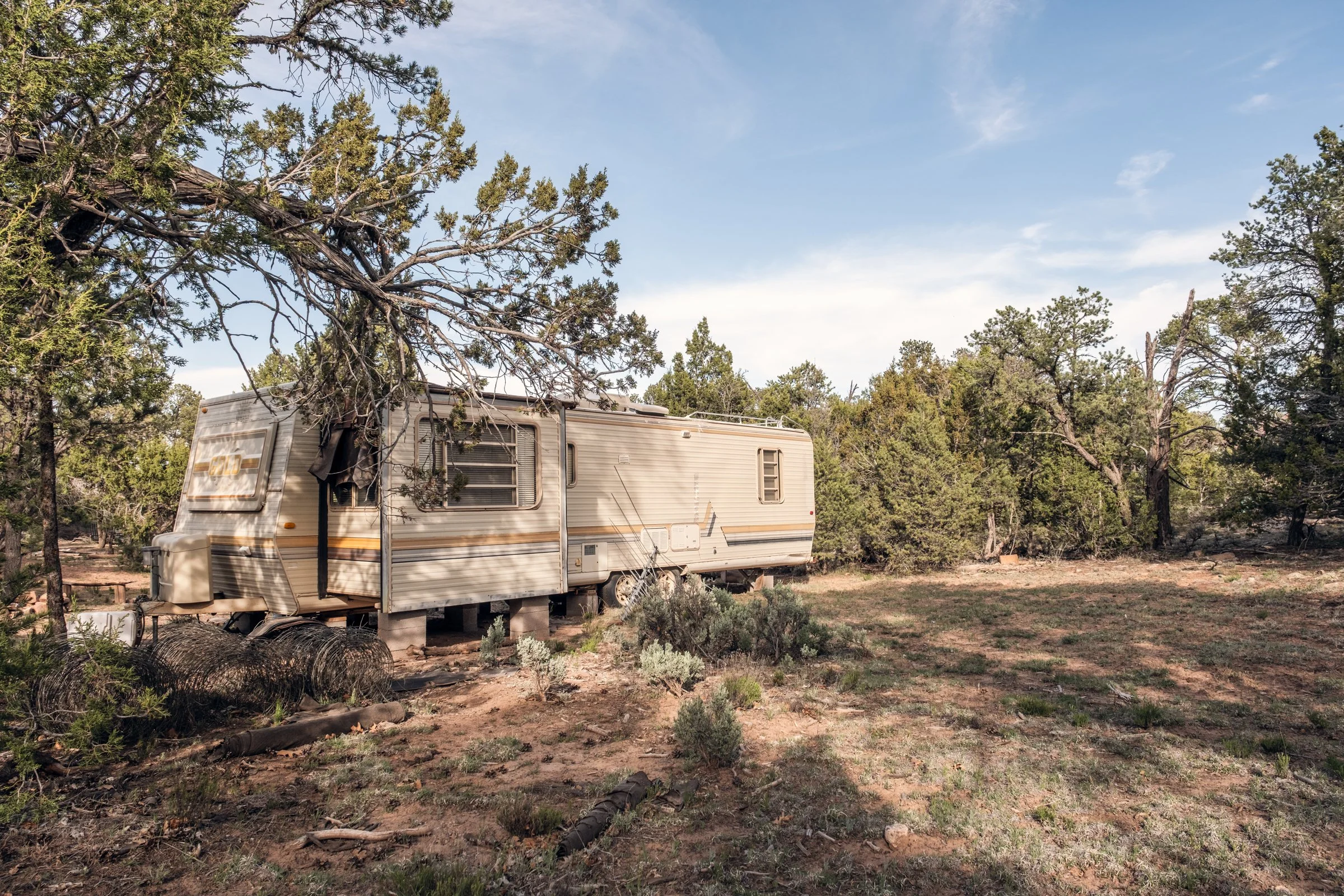 Hauling Life | Navajo Nation — Unified Metadata Paragraphs

Wayne Wilson and Joann Whiting collect water in Gallup, New Mexico at a community water source. The containers are filled, prepared, and loaded into their vehicle for transport across the Na