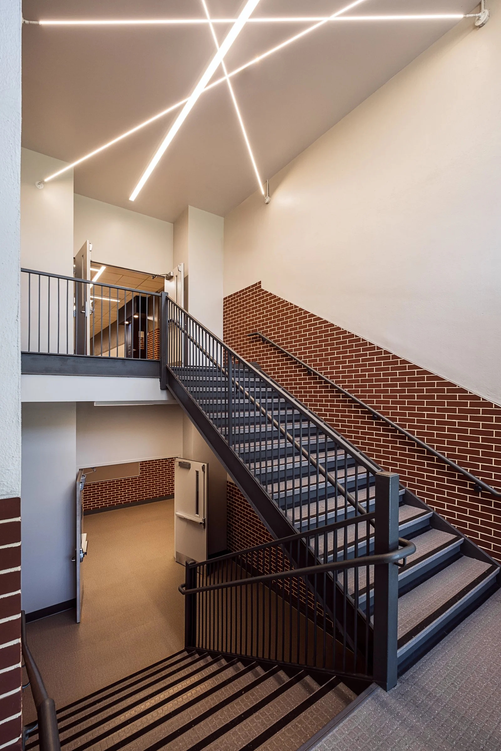 Interior view at Tri-cities Christian academy, highlighting [space/design feature] and the renovated student living environment. Completed by Johnson Architectue and photographed by Lange Photo Studio. 