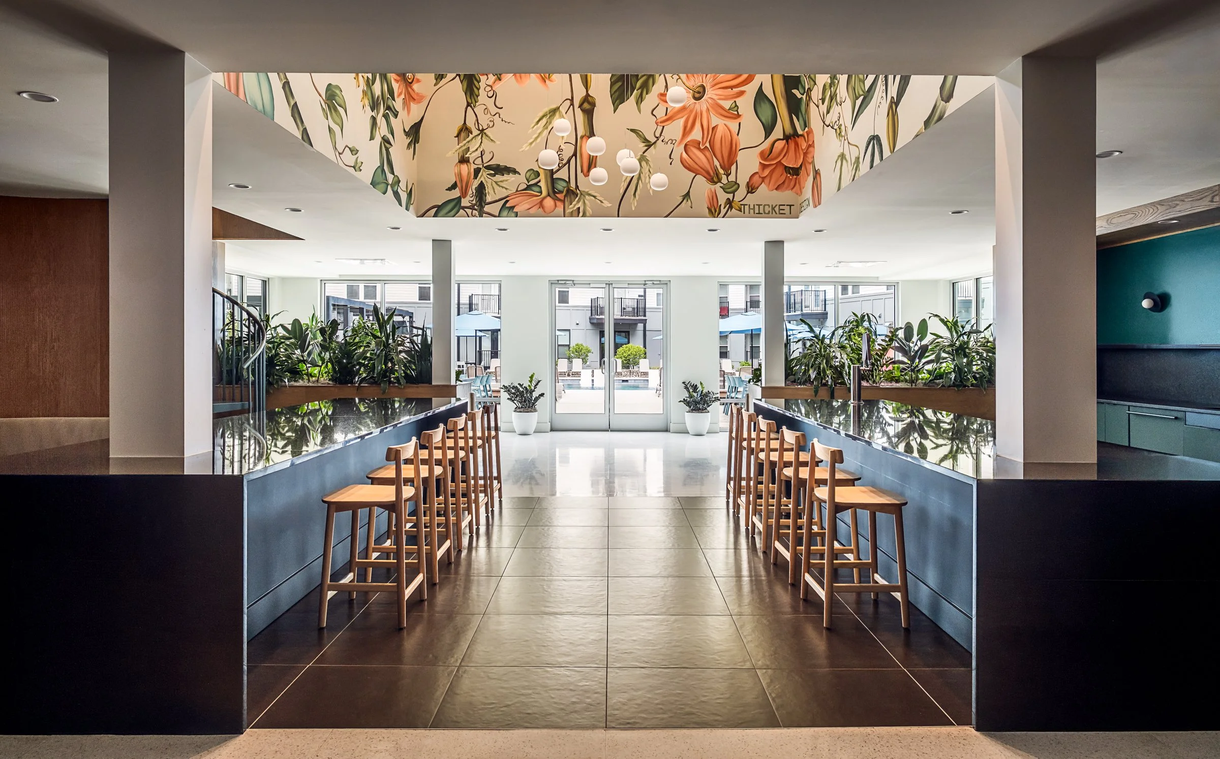 Architectural photography by Paul Lange of Lange Photo Studio, showcasing The Guild in Richmond, VA. The series captures the building's modern design, vibrant communal spaces, rooftop lounge, resort-style pool, highlighting the dynamic living experie