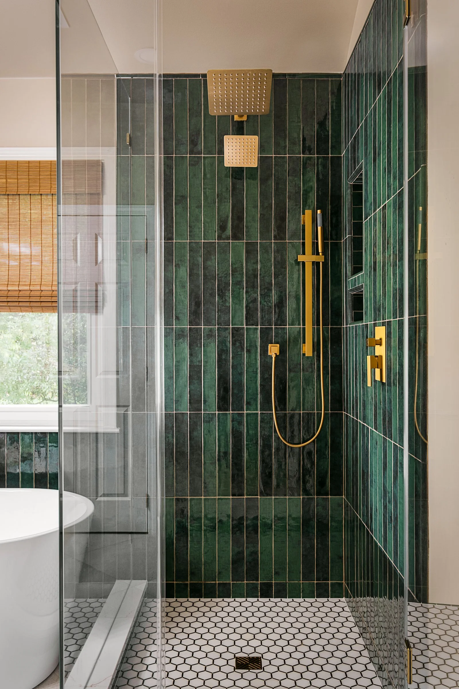This luxury residential bathroom in North Carolina designed by Veritas Construction. Photographed by Charlotte-based architectural and interior photographer Paul Lange, this interior design photography series highlights custom wallpaper, and thoughtf
