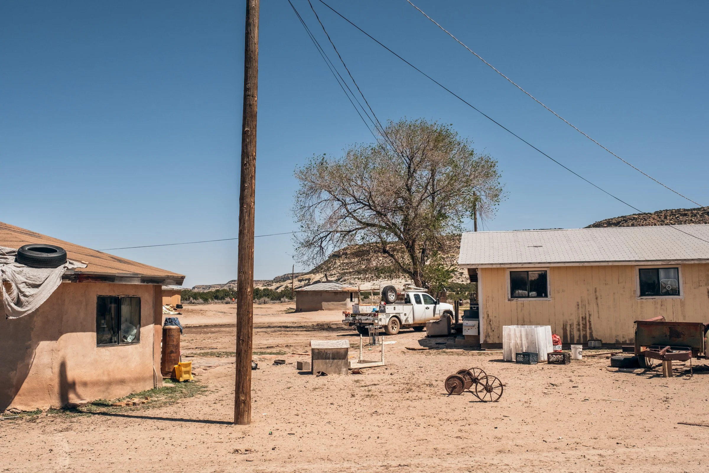 Hauling Life | Navajo Nation — 
Wayne Wilson and Joann Whiting collect water in Gallup, New Mexico at a community water source. The containers are filled, prepared, and loaded into their vehicle for transport across the Navajo Nation.

They depart on