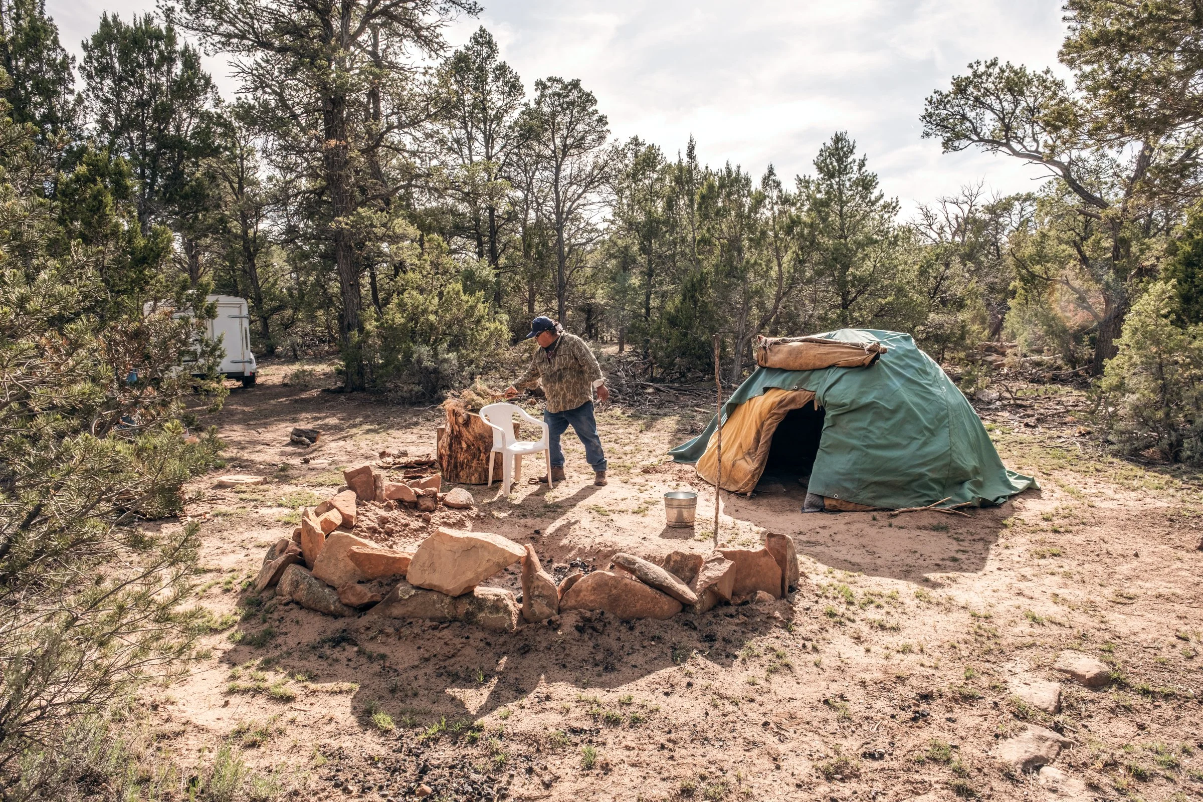 Hauling Life | Navajo Nation — Unified Metadata Paragraphs

Wayne Wilson and Joann Whiting collect water in Gallup, New Mexico at a community water source. The containers are filled, prepared, and loaded into their vehicle for transport across the Na