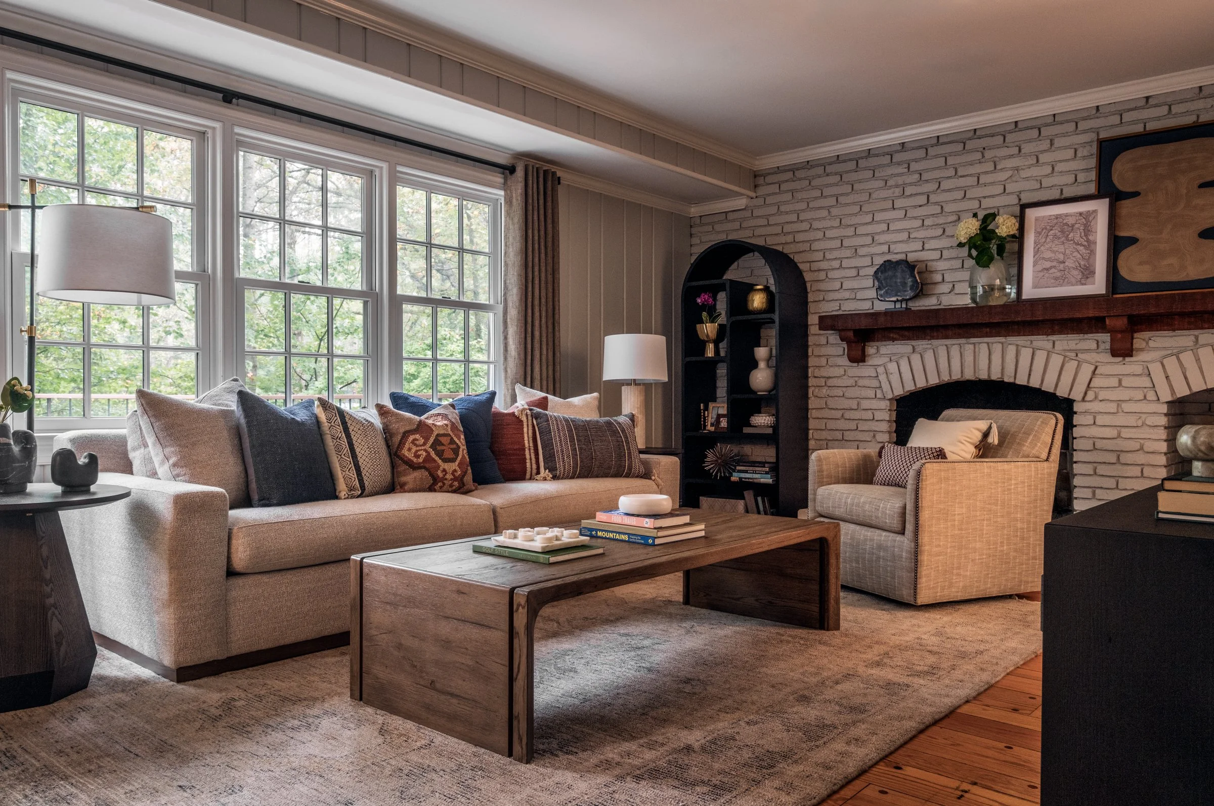 Tk.e Design showcasing a stunning living room interior design photographed by Lange Photo Studio. 