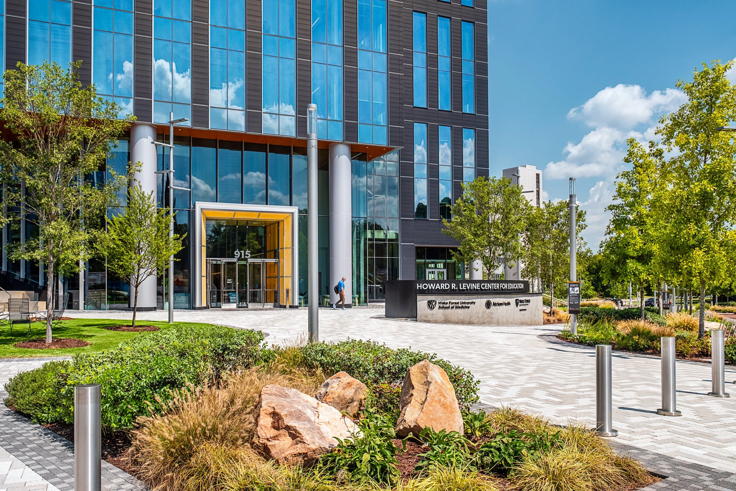 Landscape architecture photography of The Pearl in Charlotte, North Carolina, commissioned by Kimley-Horn and photographed by Paul Lange of Lange Photo Studio. The project features landscaped public spaces, a terraced central plaza, and the Purposefu