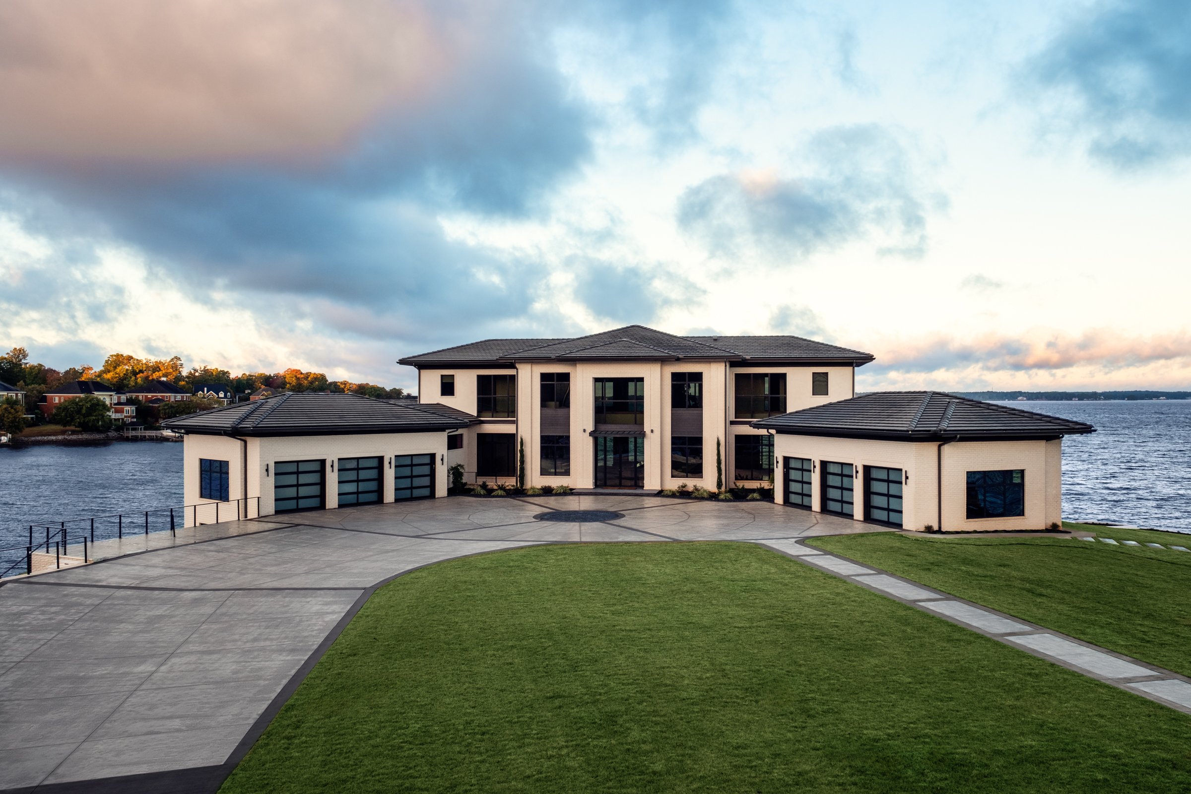 Architectural and interior photography of a customized lakefront home, highlighting design detail, atmosphere, infinity pool, and craftsmanship.