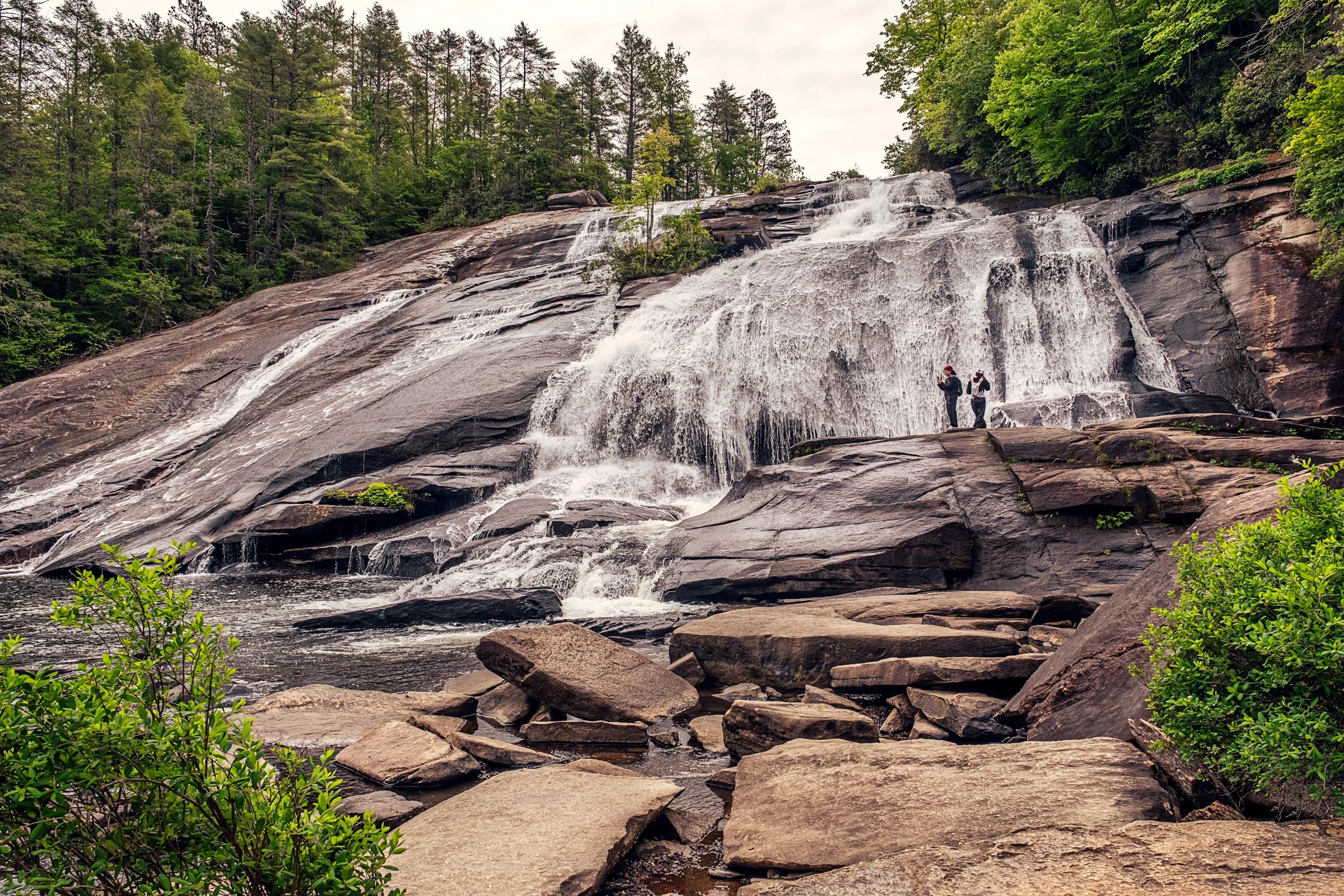 Hooker Falls and High Falls, two waterfalls in DuPont State Forest near Asheville, North Carolina. Photographed by Lange Photo Studio. 