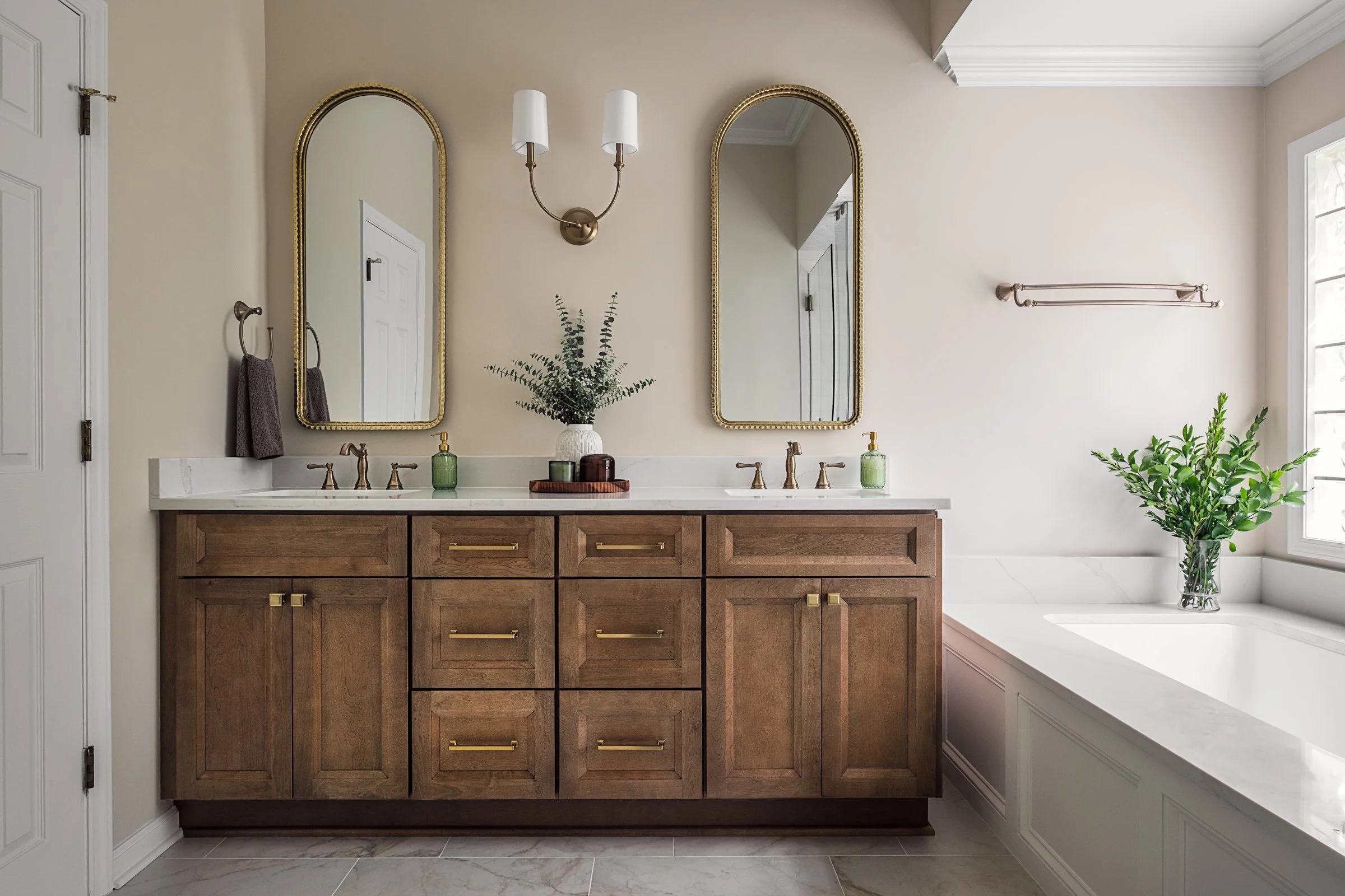 This luxury residential bathroom in North Carolina designed by Veritas Construction. Photographed by Charlotte-based architectural and interior photographer Paul Lange, this interior design photography series highlights custom wallpaper, and thoughtf