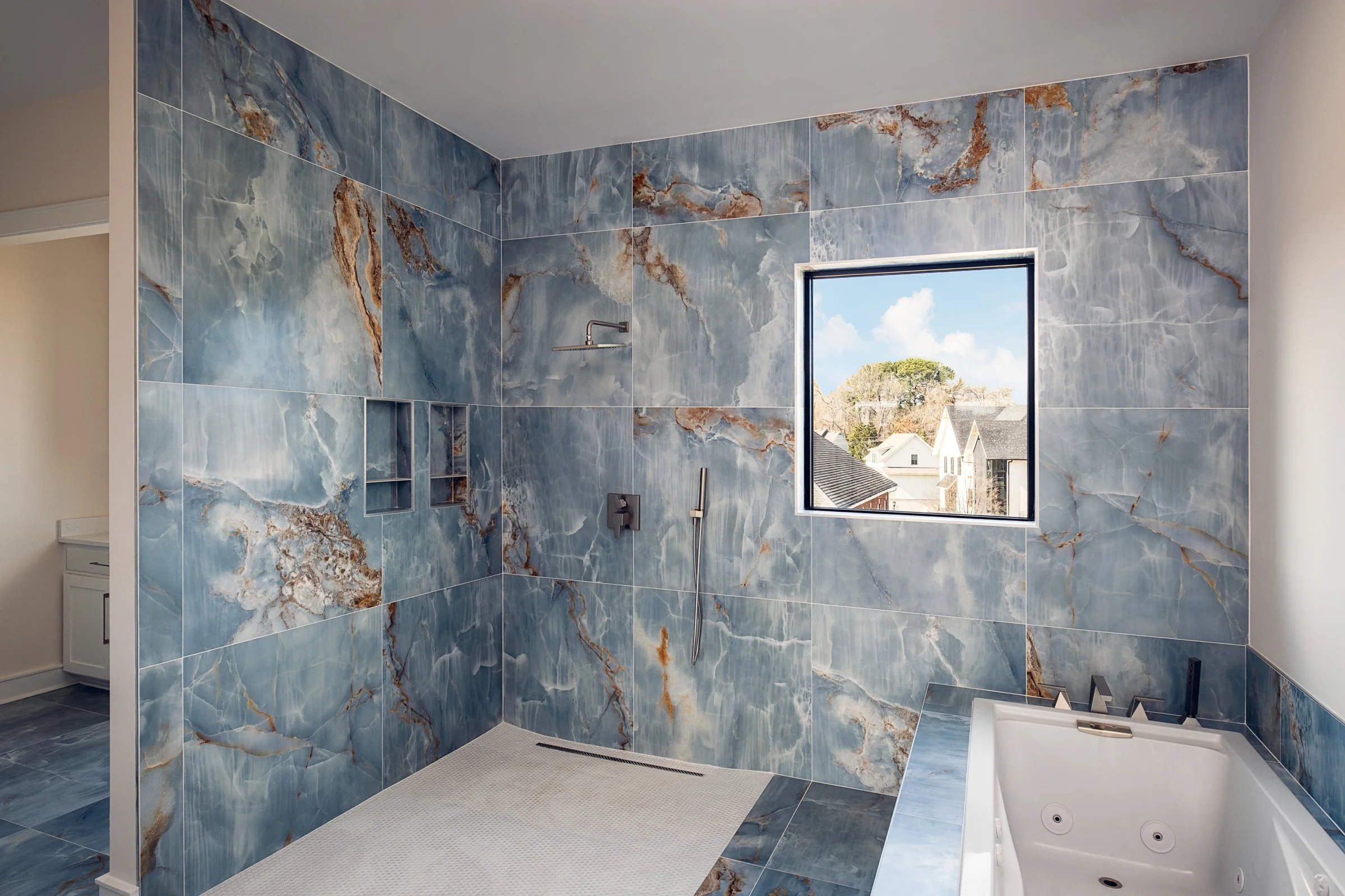 Architectural and interior photography of a customized lakefront home, highlighting design detail, atmosphere, infinity pool, and craftsmanship.