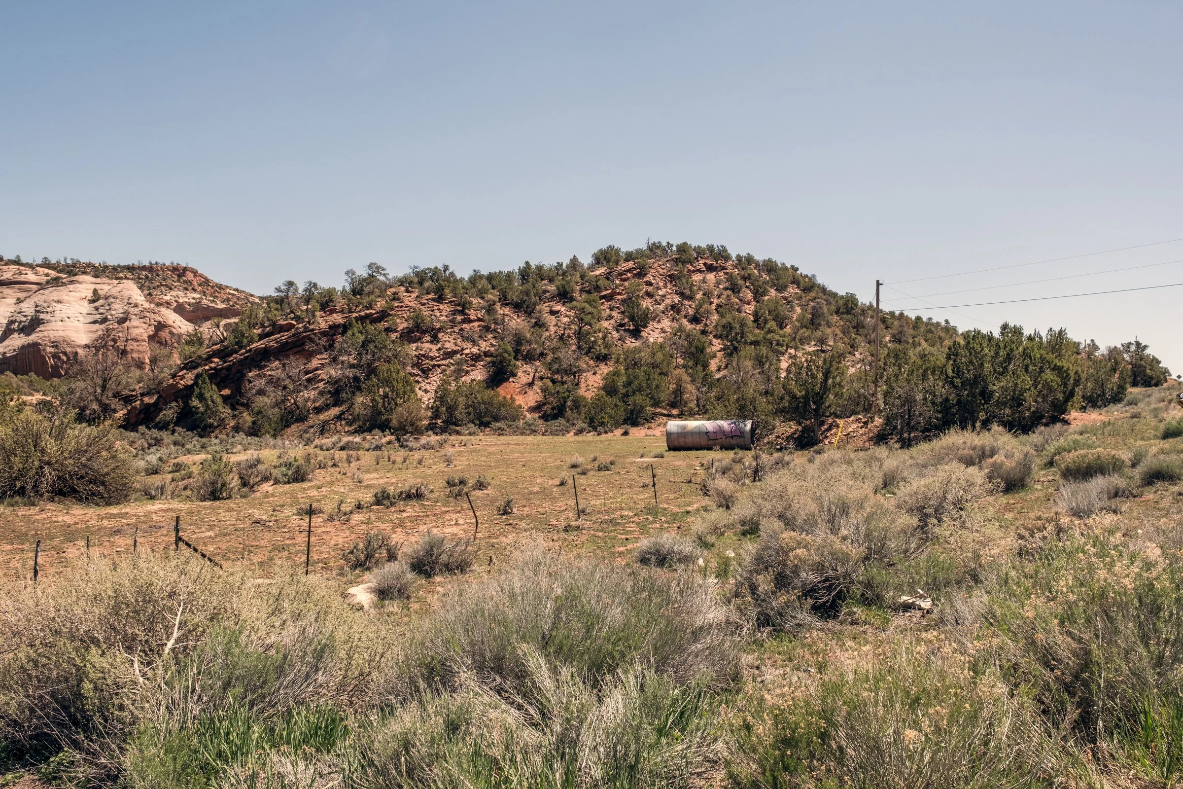 Hauling Life | Navajo Nation — Unified Metadata Paragraphs

Wayne Wilson and Joann Whiting collect water in Gallup, New Mexico at a community water source. The containers are filled, prepared, and loaded into their vehicle for transport across the Na