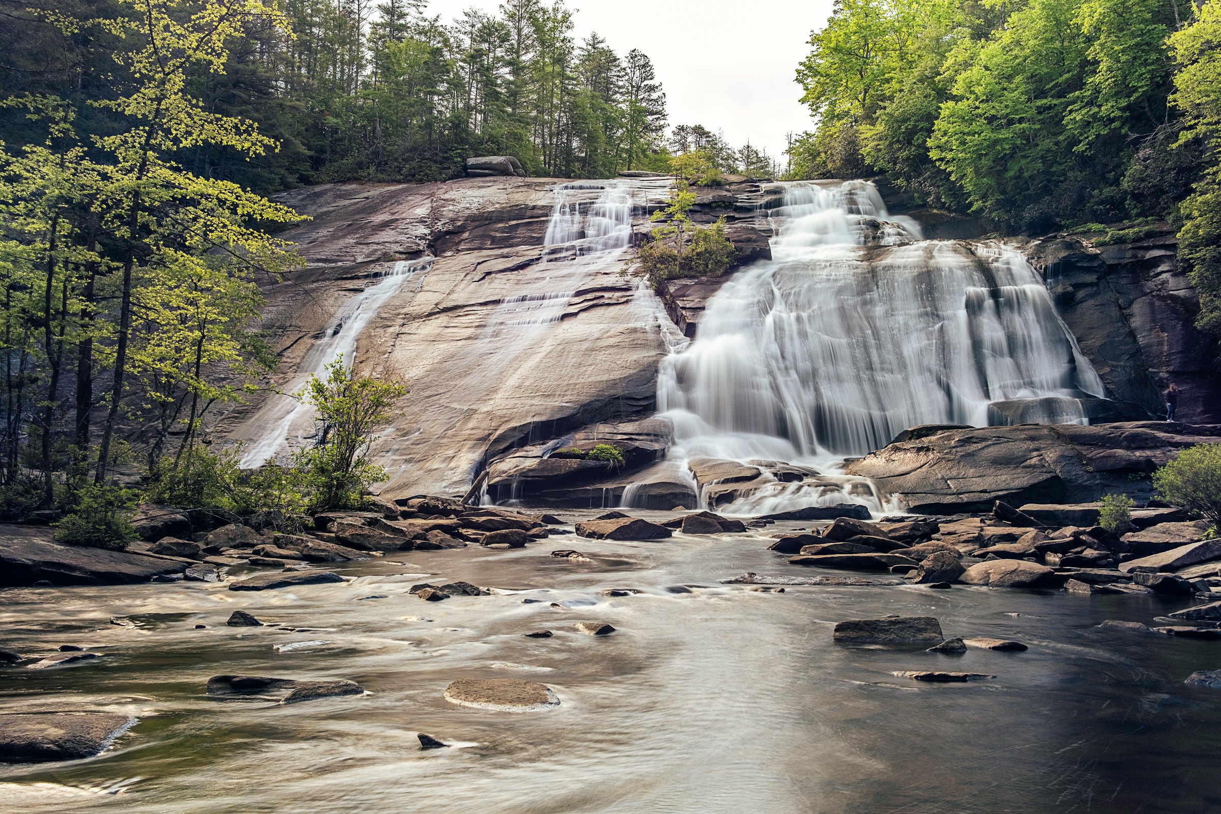 Hooker Falls and High Falls, two waterfalls in DuPont State Forest near Asheville, North Carolina. Photographed by Lange Photo Studio. 