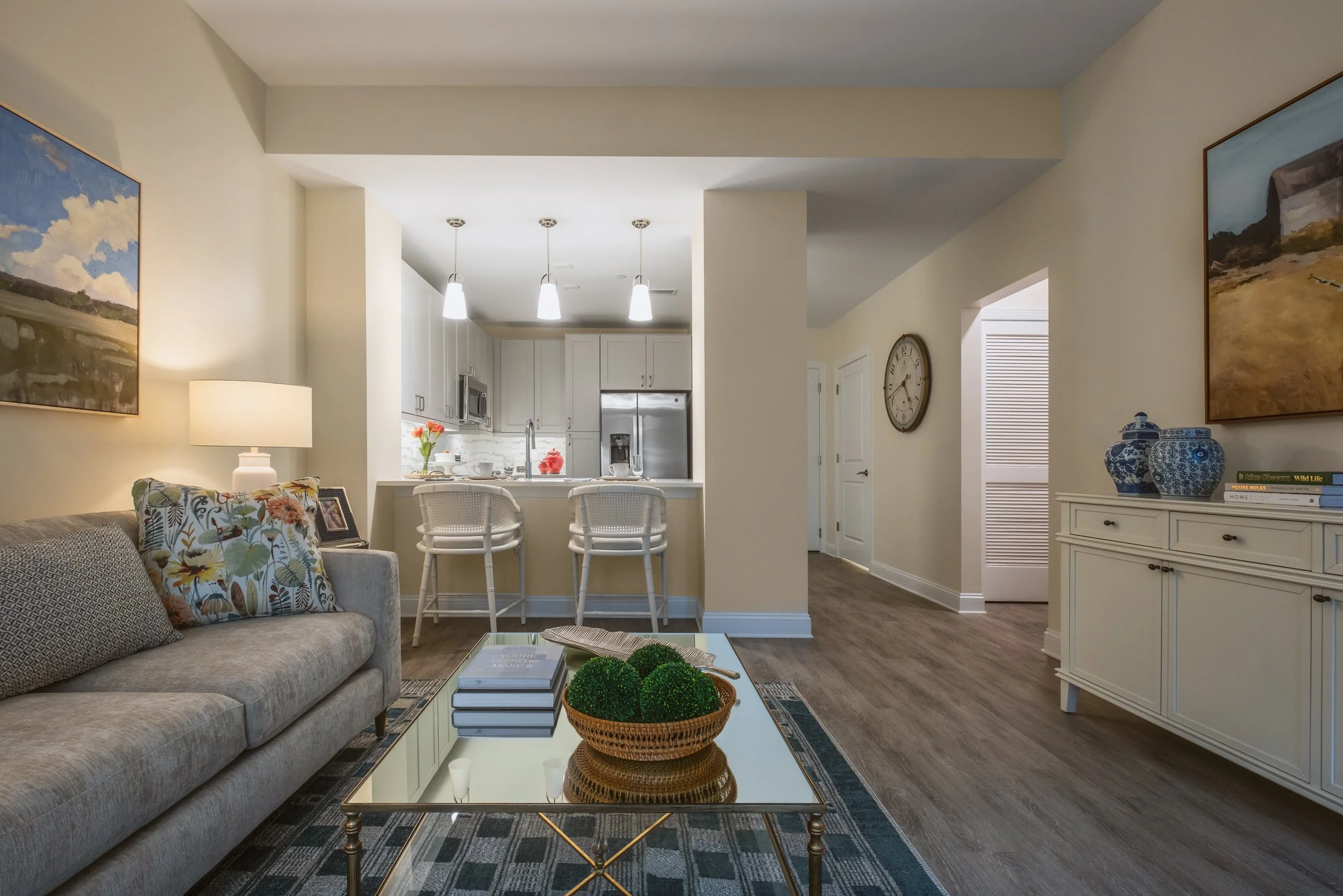 Open concept dining and entertainment space in Village on Morehead unit highlighting contemporary design elements