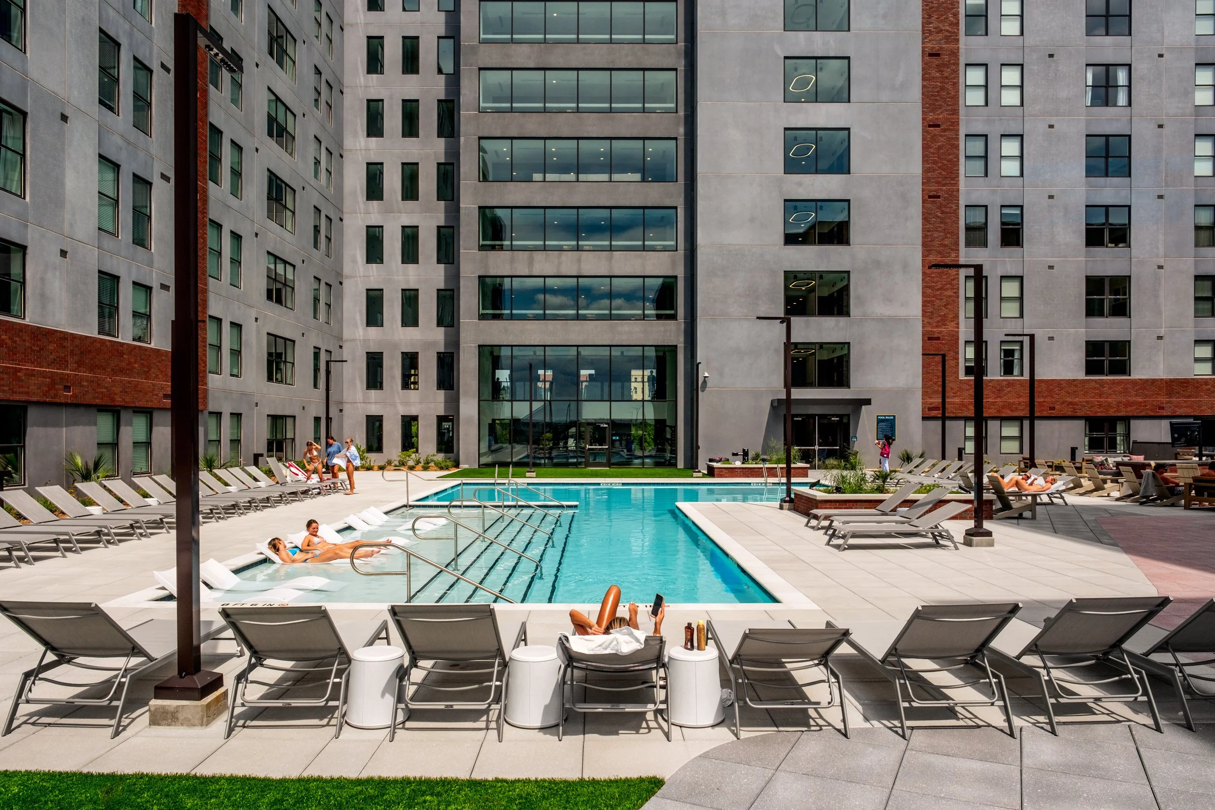 Architectural and lifestyle photography by Paul Lange of Lange Photo Studio, showcasing Gateway 737, a 940-bed student housing community near the University of South Carolina. The series captures the building's modern design, vibrant communal spaces,