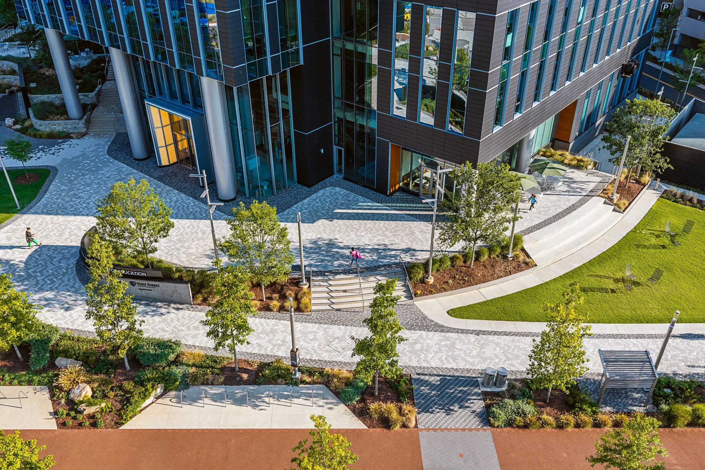 Landscape architecture photography of The Pearl in Charlotte, North Carolina, commissioned by Kimley-Horn and photographed by Paul Lange of Lange Photo Studio. The project features landscaped public spaces, a terraced central plaza, and the Purposefu