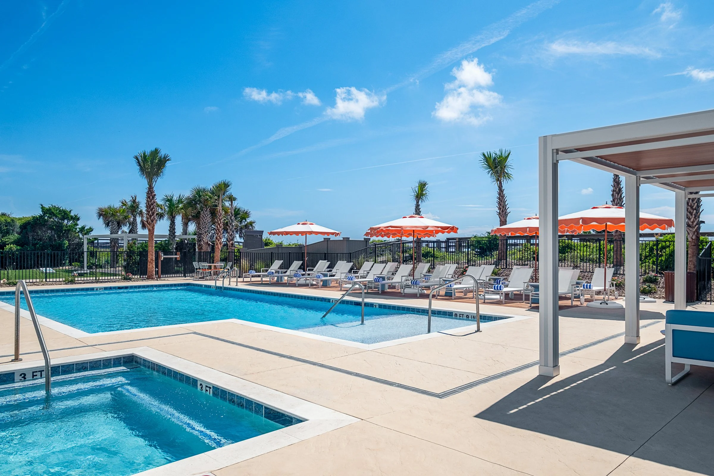 New Pool area photography at Golden Sands Hotel, showing thoughtful composition, branded consistency, fun, and uncluttered guest environment. Photographed by Lange Photo Studio. 