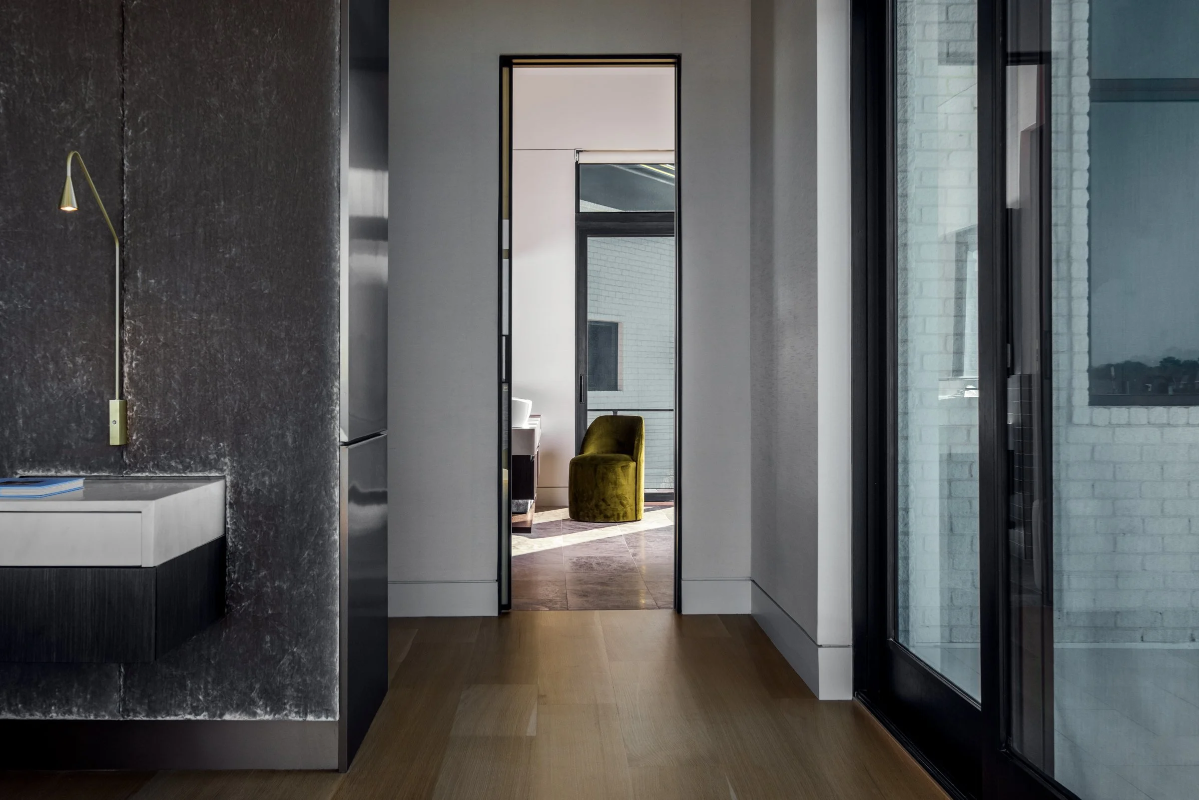 Architectural and interior photography of a customized lakefront home, highlighting design detail, atmosphere, infinity pool, and craftsmanship.