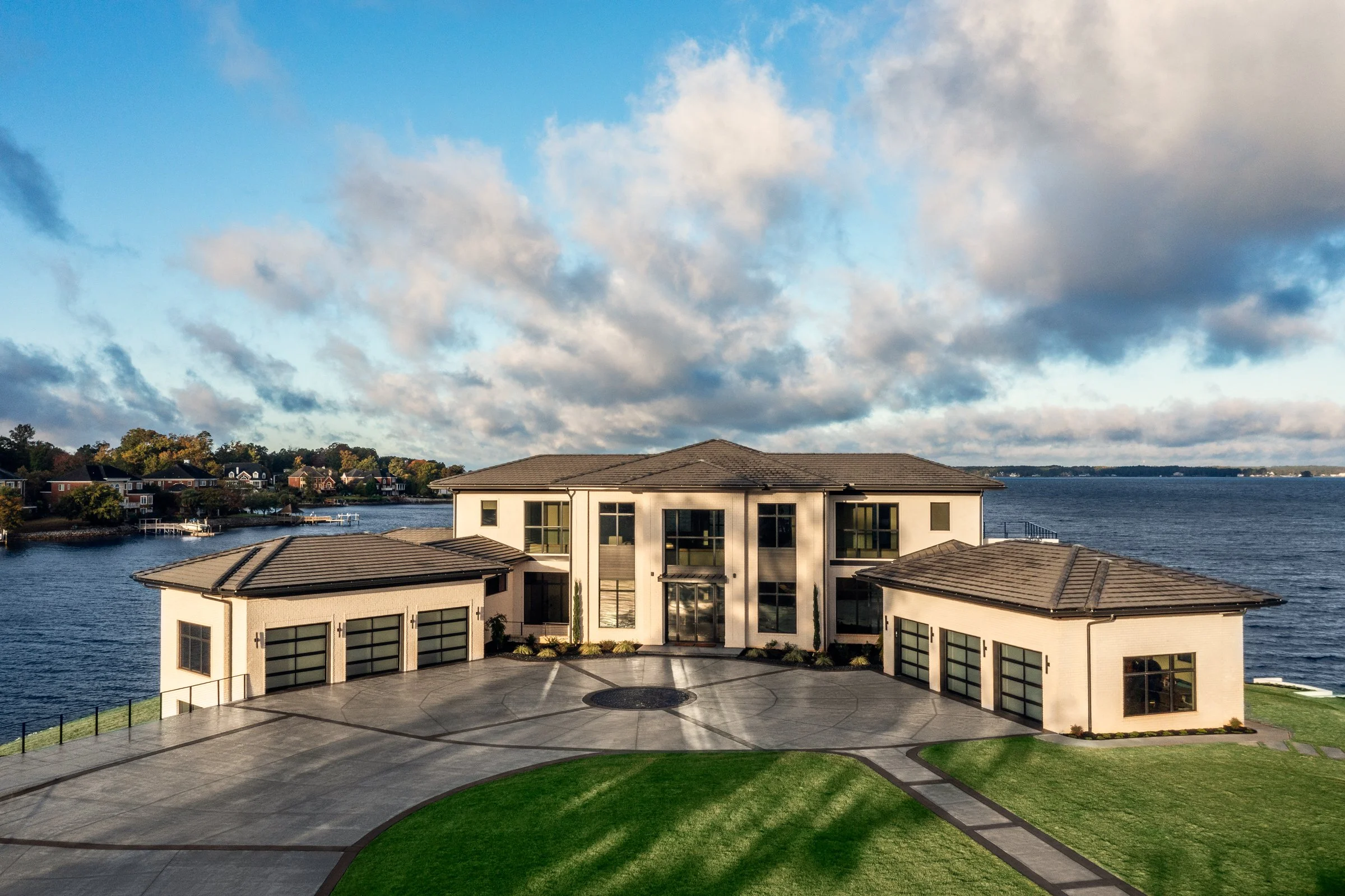 Architectural and interior photography of a customized lakefront home, highlighting design detail, atmosphere, infinity pool, and craftsmanship.